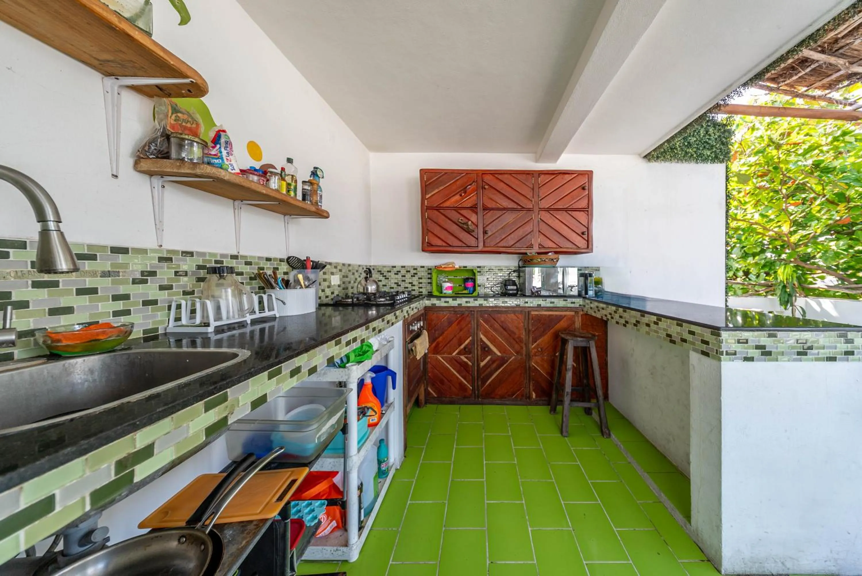 Kitchen or kitchenette in The Green Village Boutique Hotel