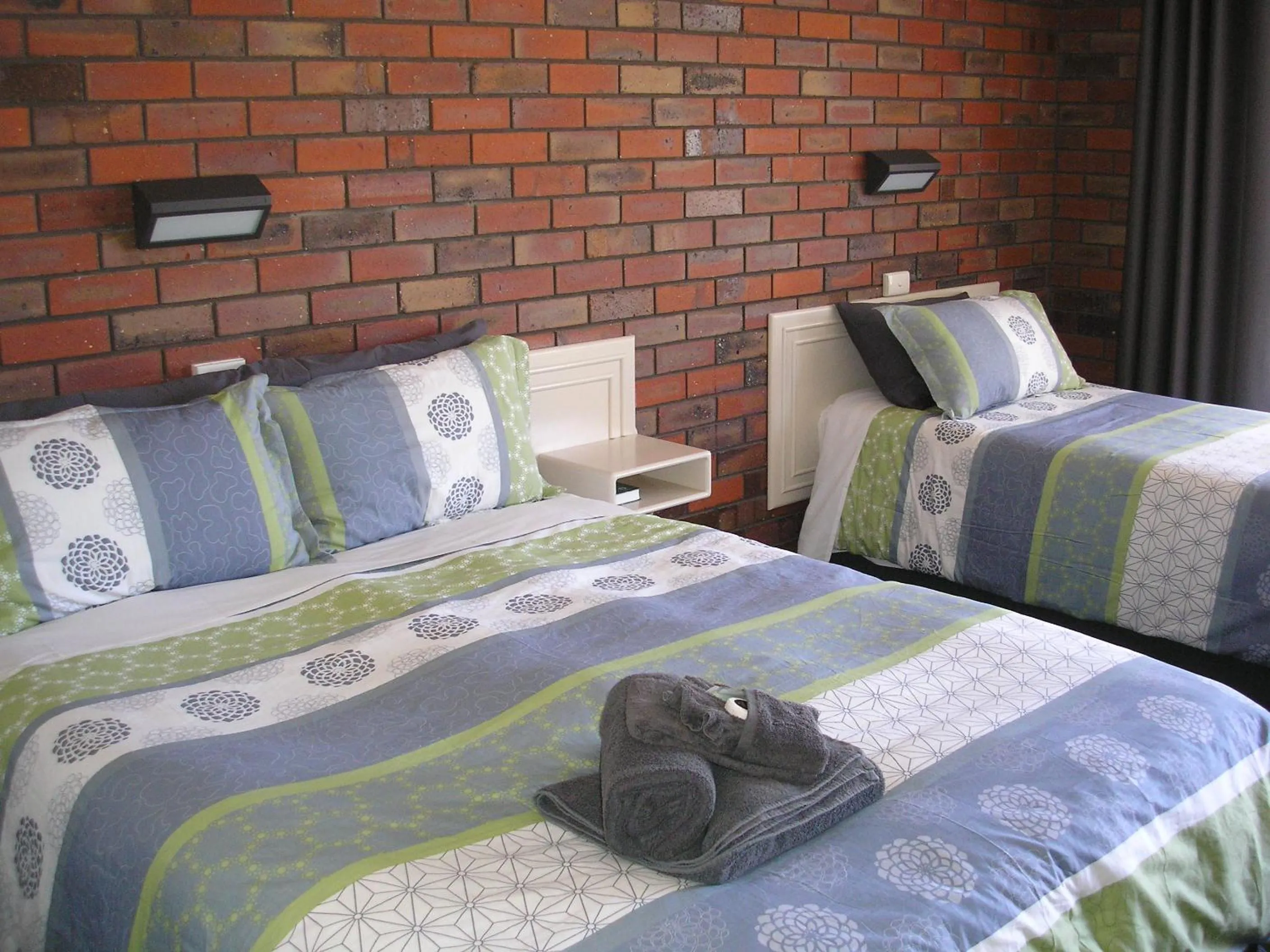 Bed in Coorrabin Motor Inn