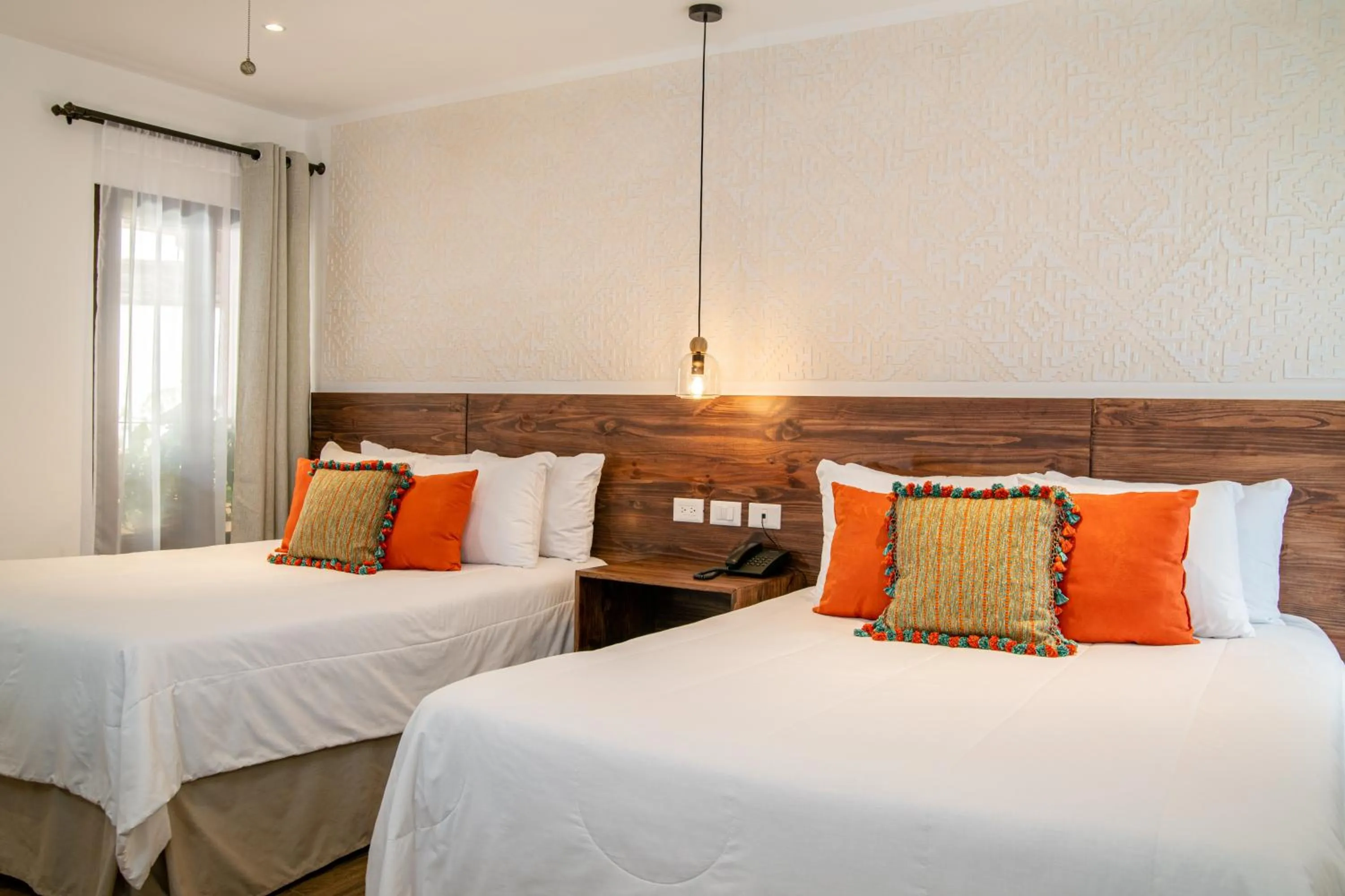 Bed in Hotel Las Camelias Inn by AHS