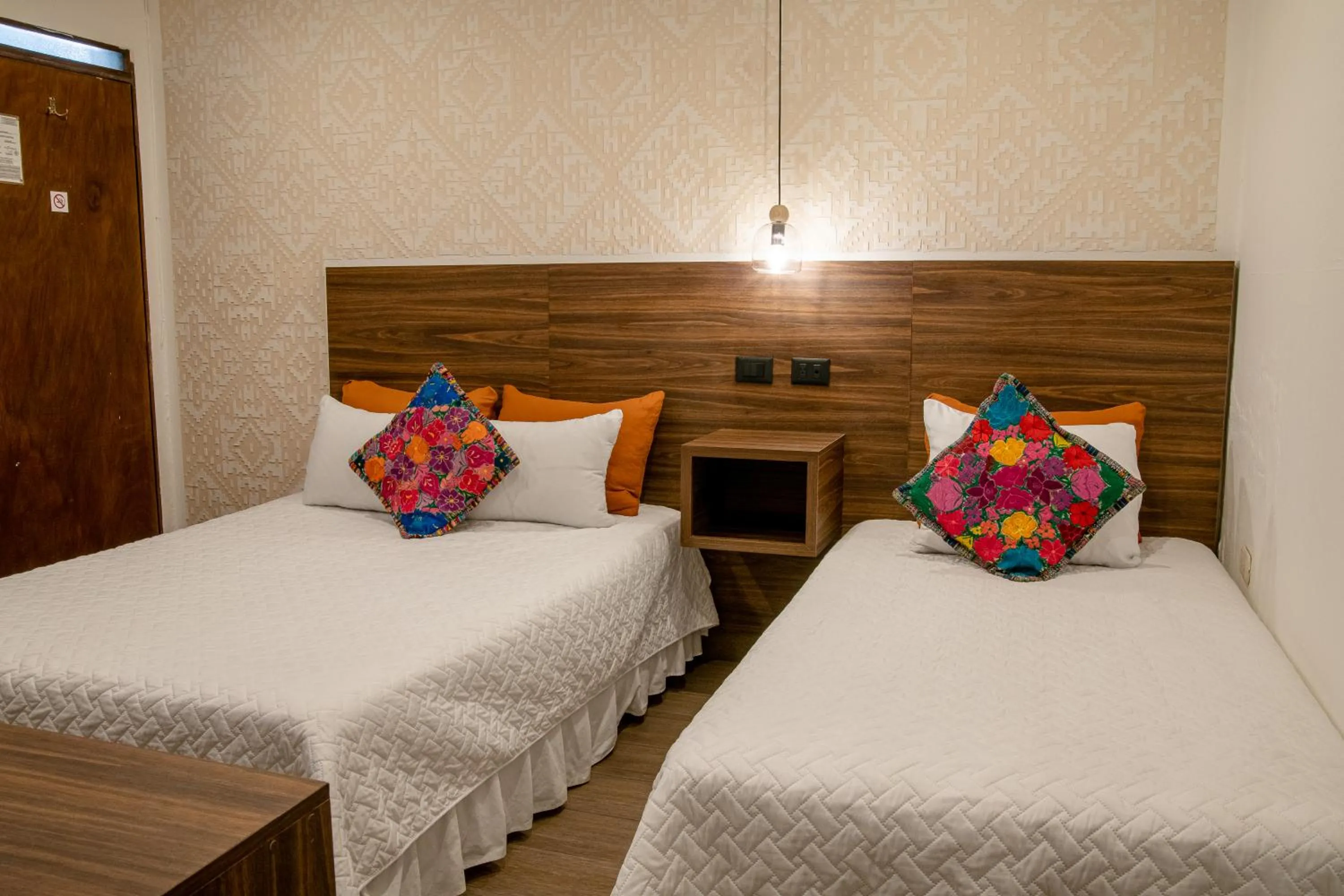 Bed in Hotel Las Camelias Inn by AHS