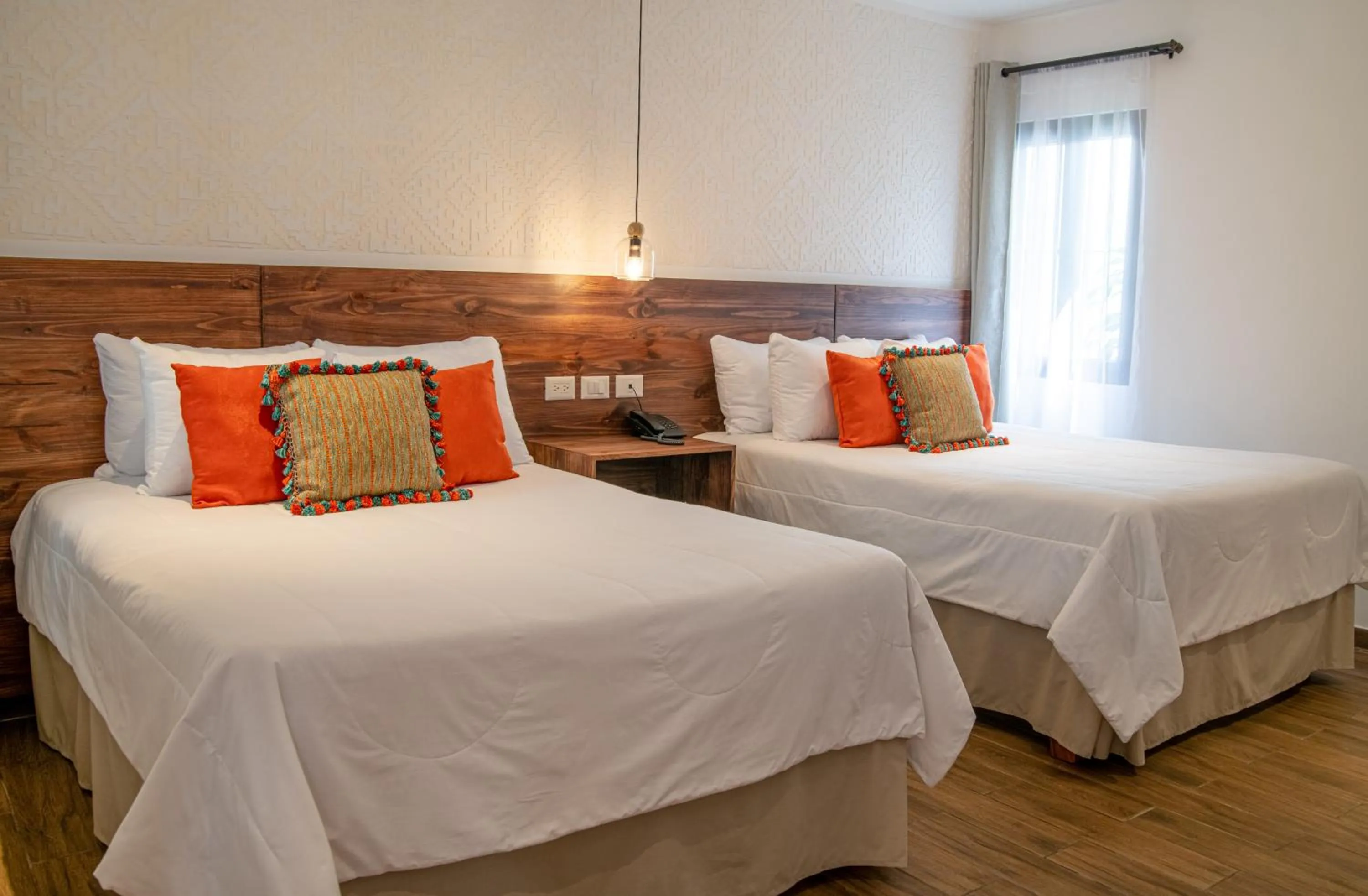 Bed in Hotel Las Camelias Inn by AHS