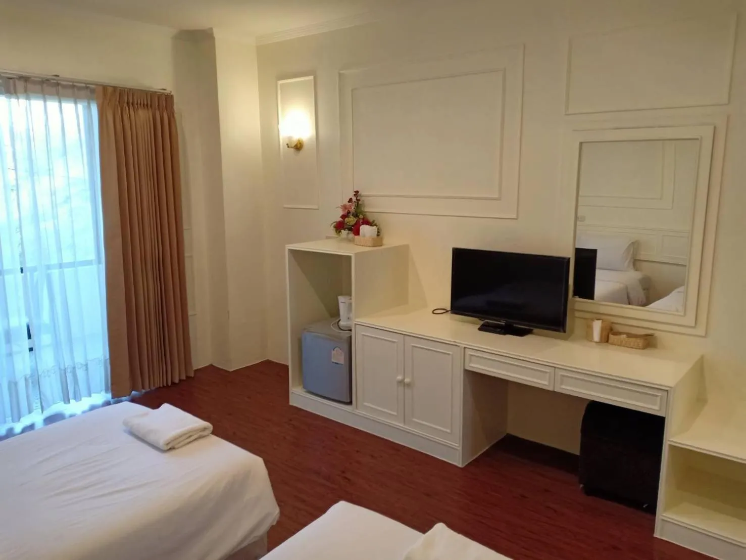 Bed in Golden Dragon Resort