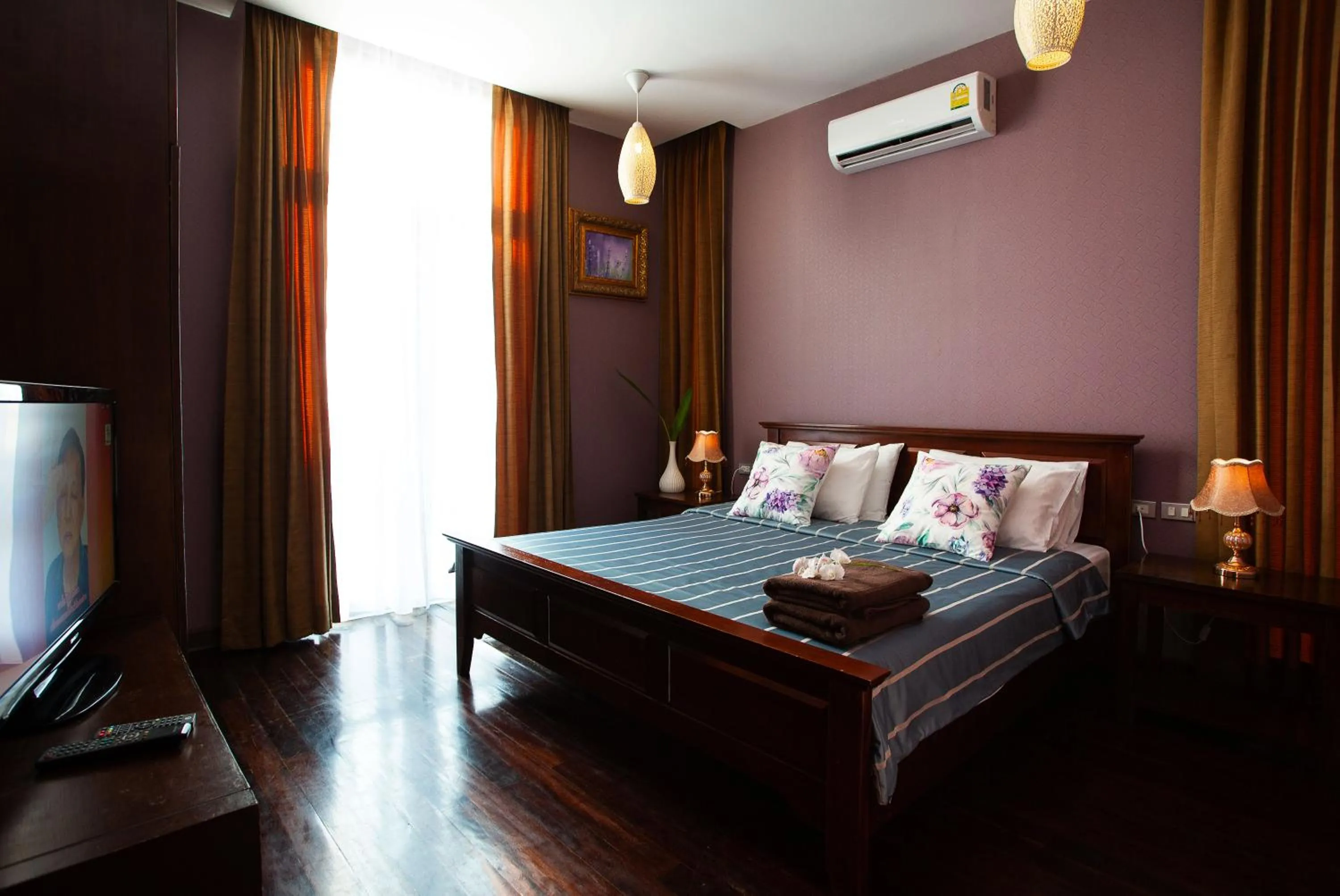 Bed in Nagawari Art Maldives BBQ Pattaya Villa