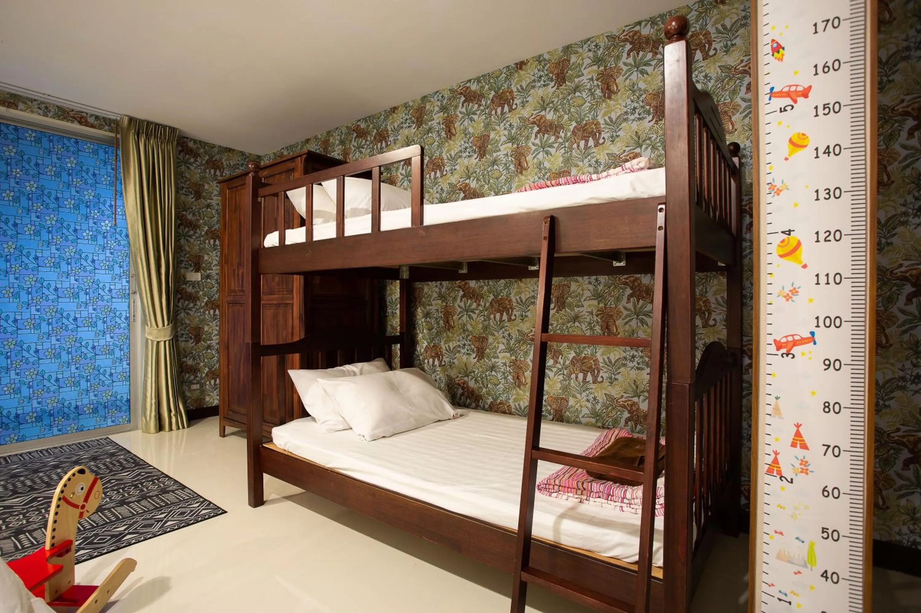 Bed in Nagawari Art Maldives BBQ Pattaya Villa