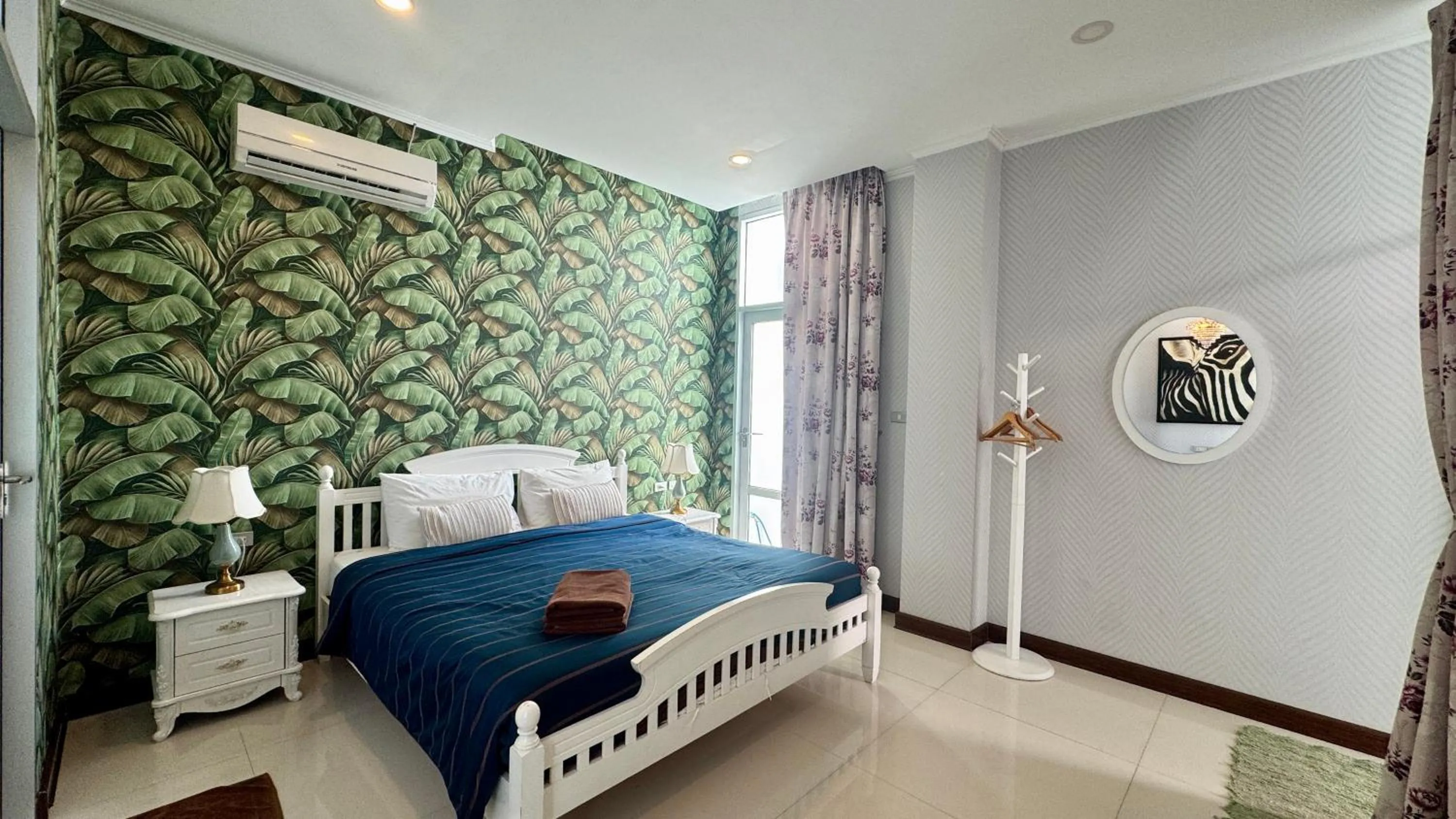 Bed in Nagawari Art Maldives BBQ Pattaya Villa