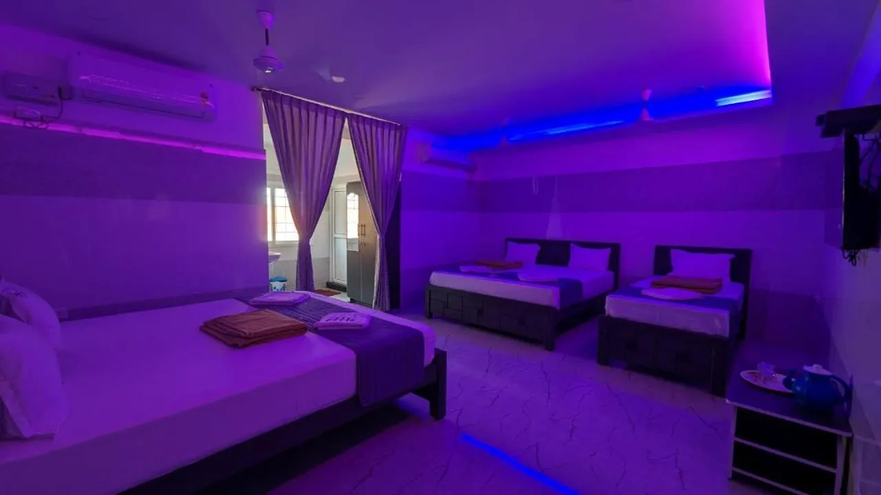Bed in HOTEL PANCHAVARNAA