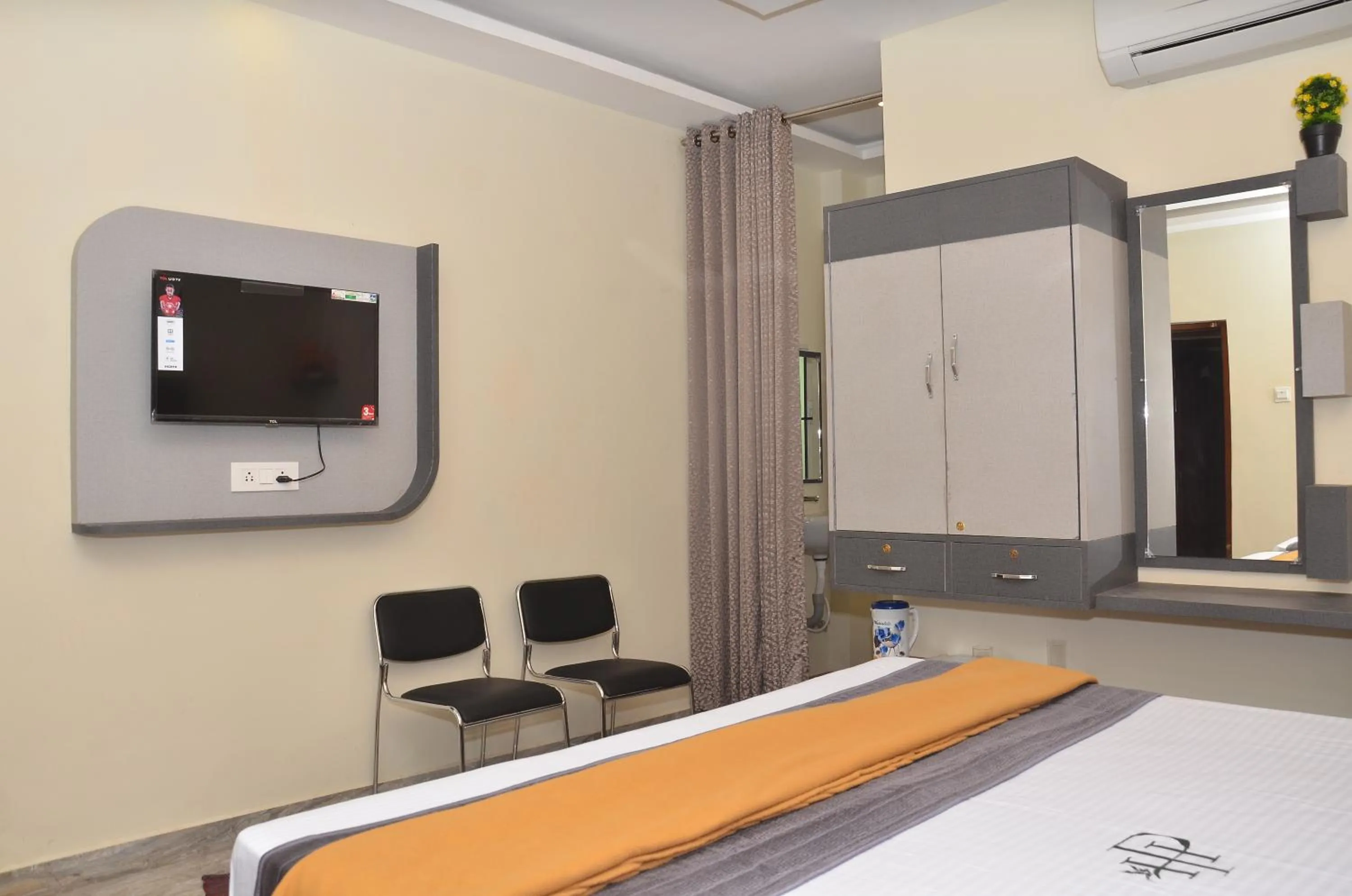 Bed in HOTEL PANCHAVARNAA