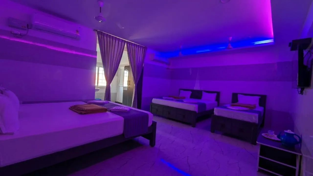 Bed in HOTEL PANCHAVARNAA