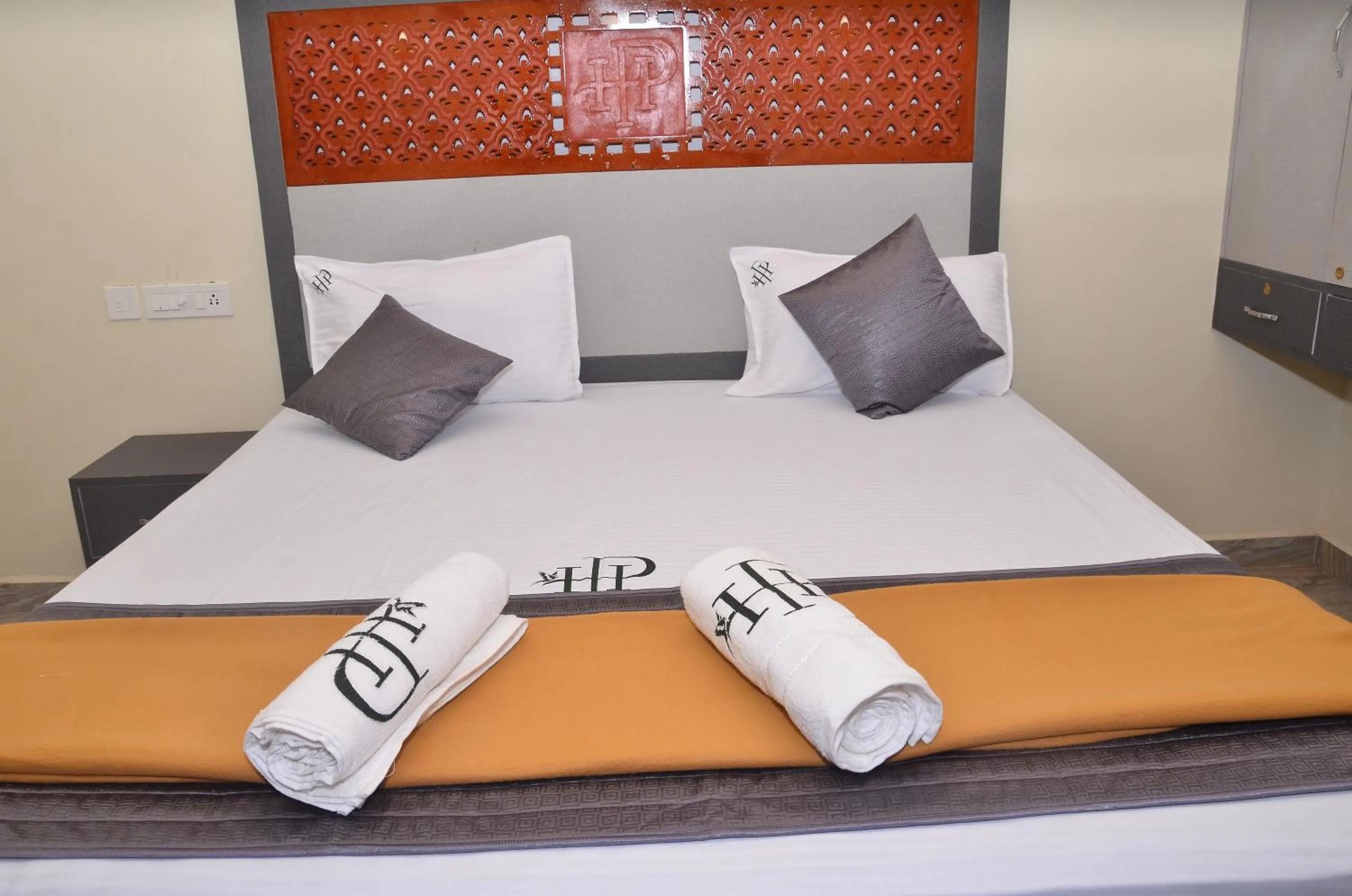 Bed in HOTEL PANCHAVARNAA