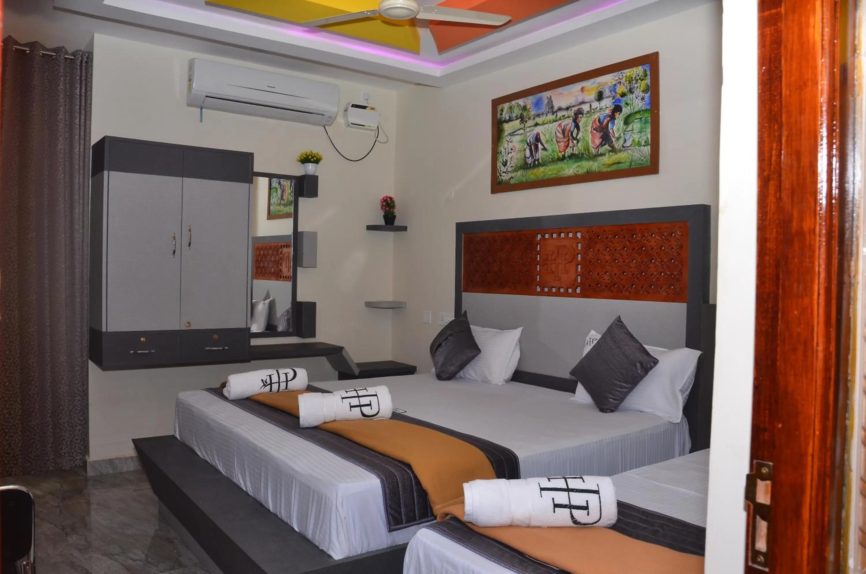 Bed in HOTEL PANCHAVARNAA