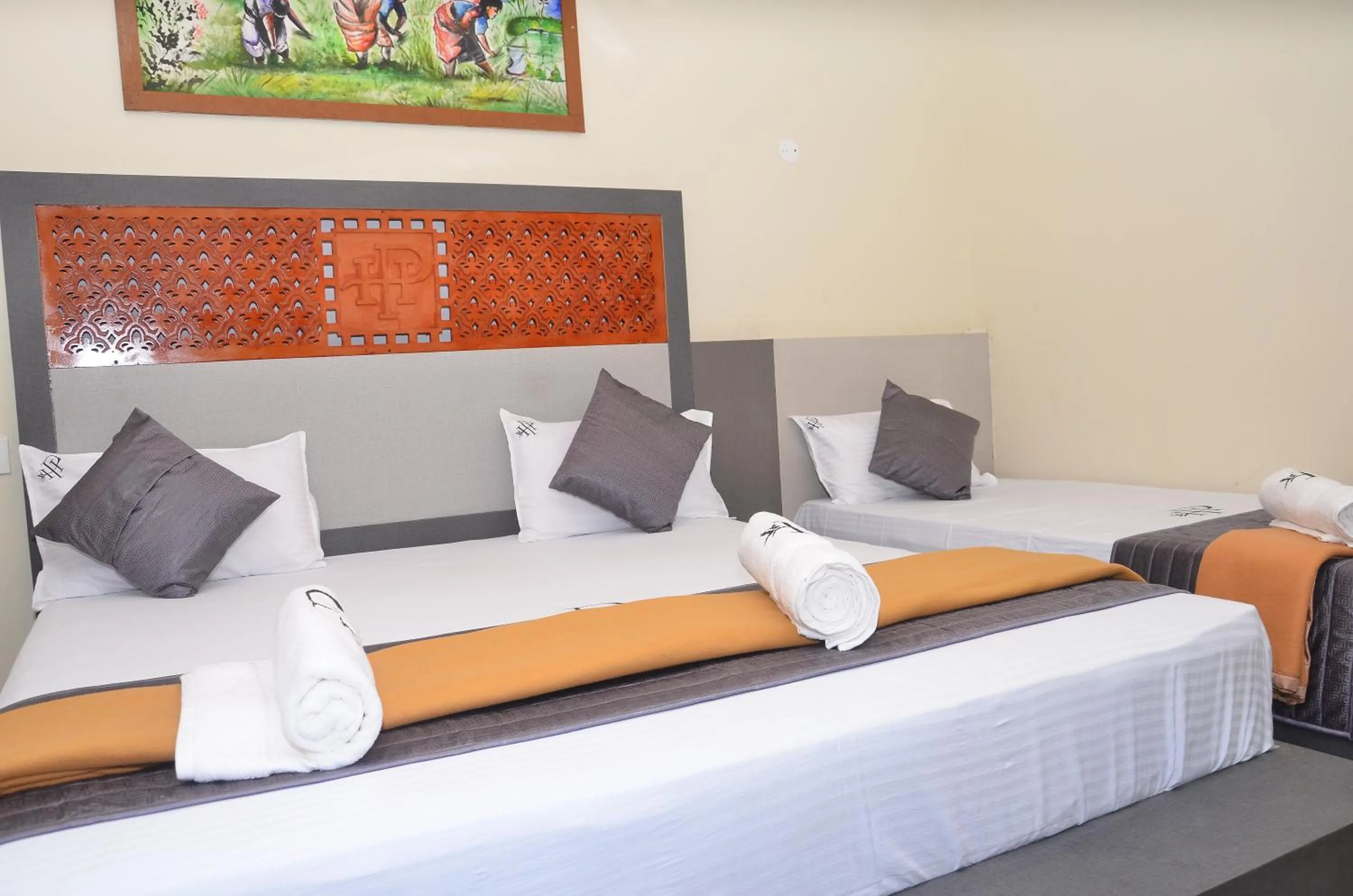 Bed in HOTEL PANCHAVARNAA