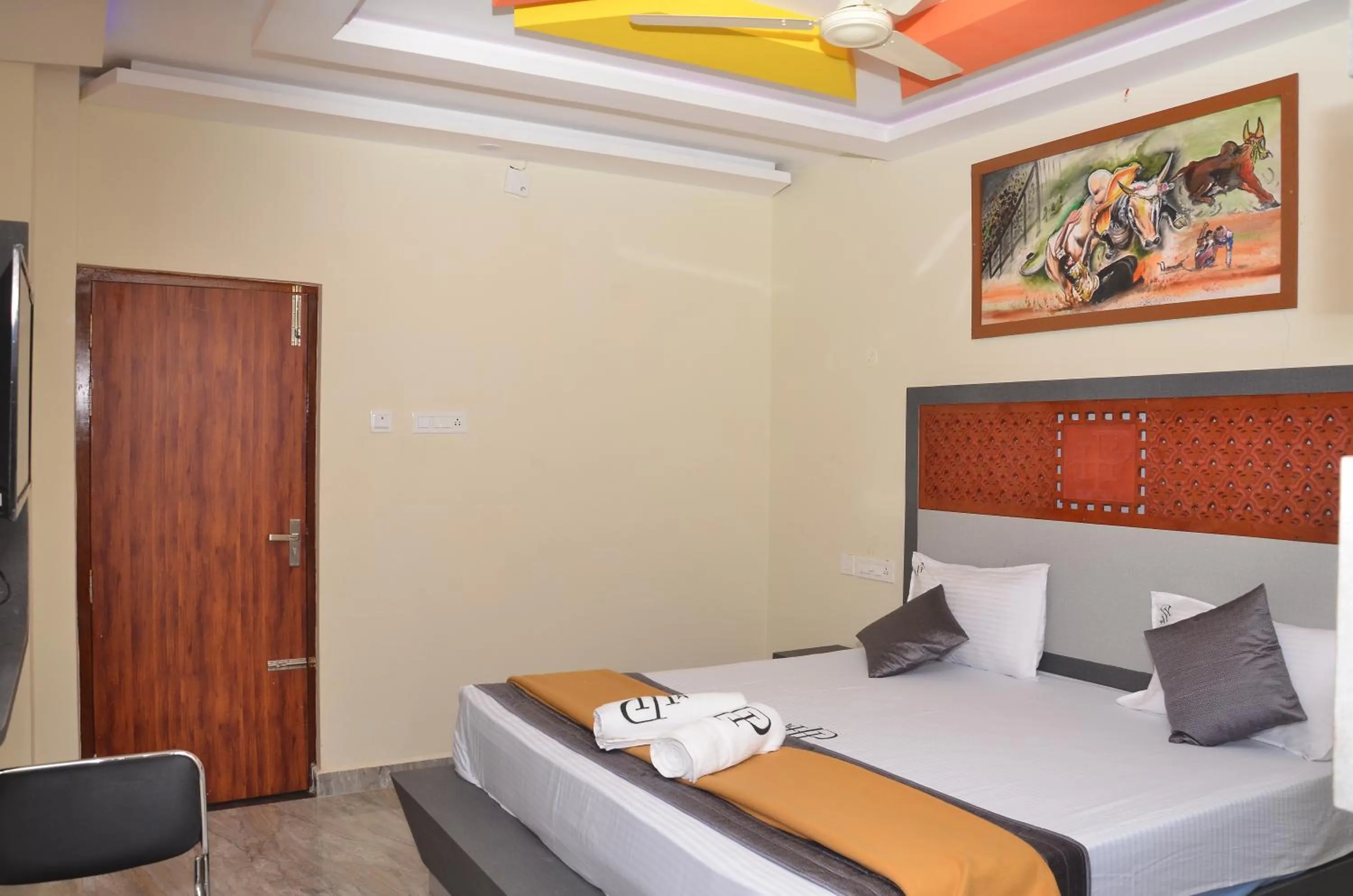 Bed in HOTEL PANCHAVARNAA