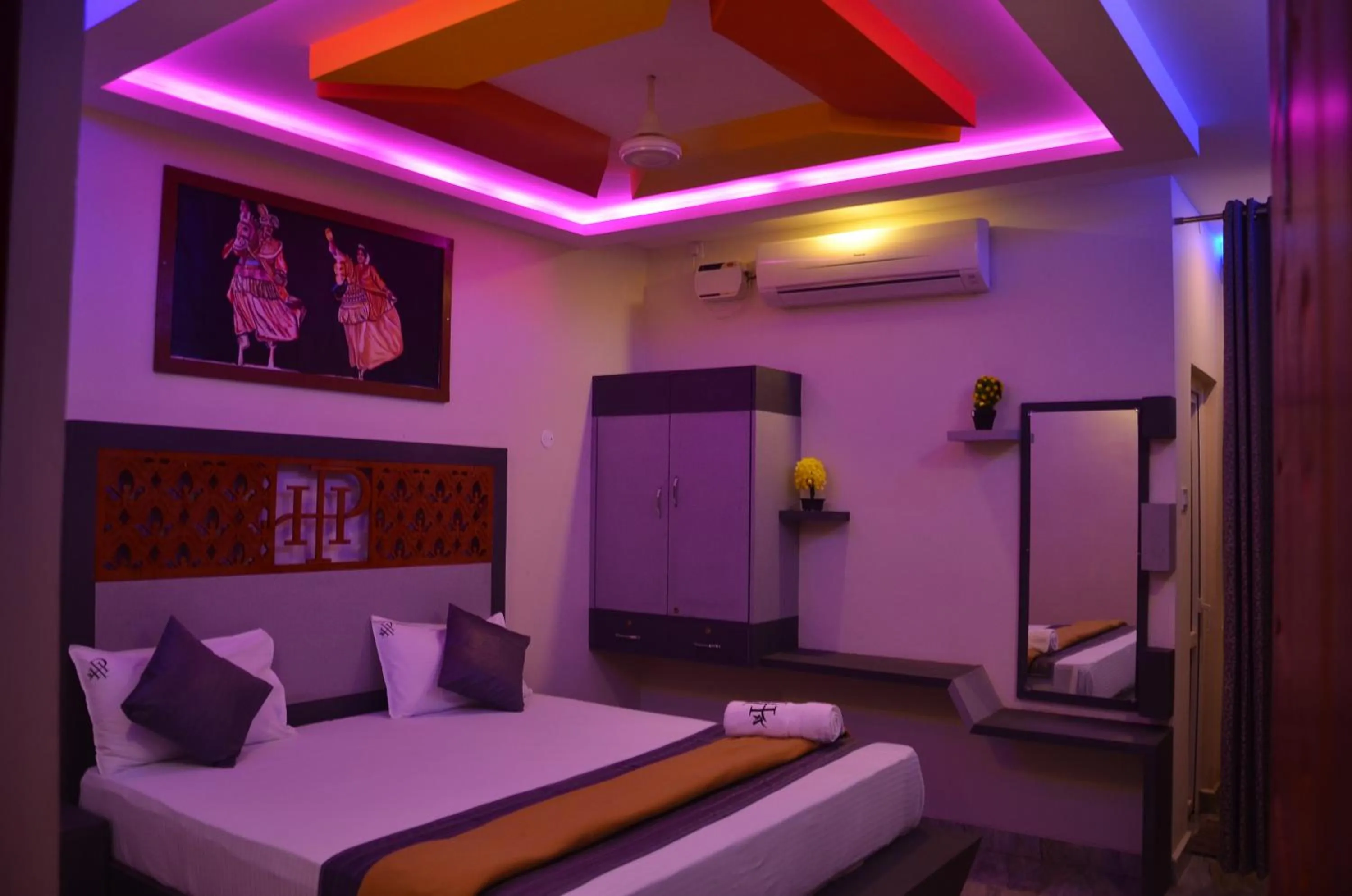 Bed in HOTEL PANCHAVARNAA