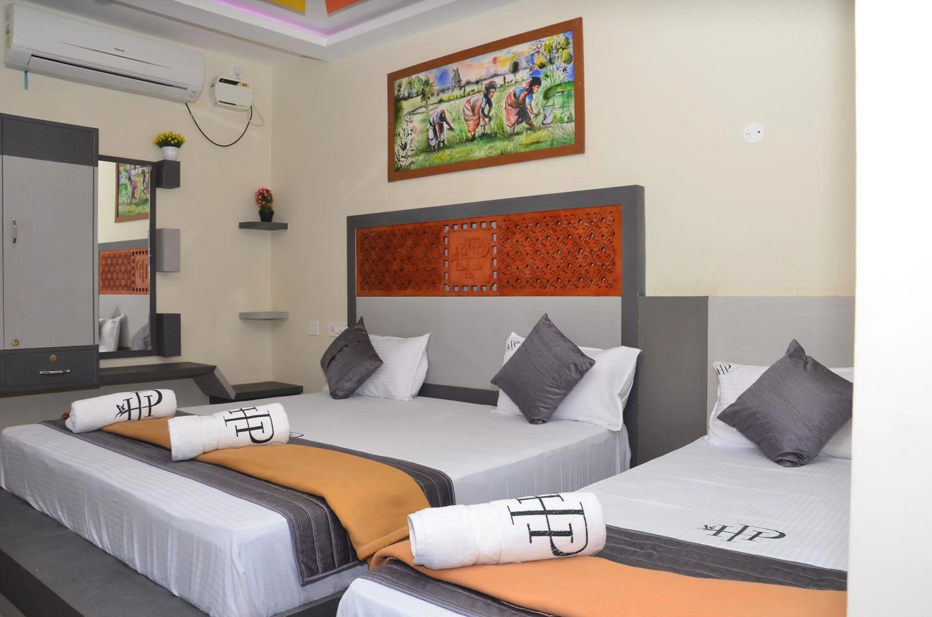 Bed in HOTEL PANCHAVARNAA
