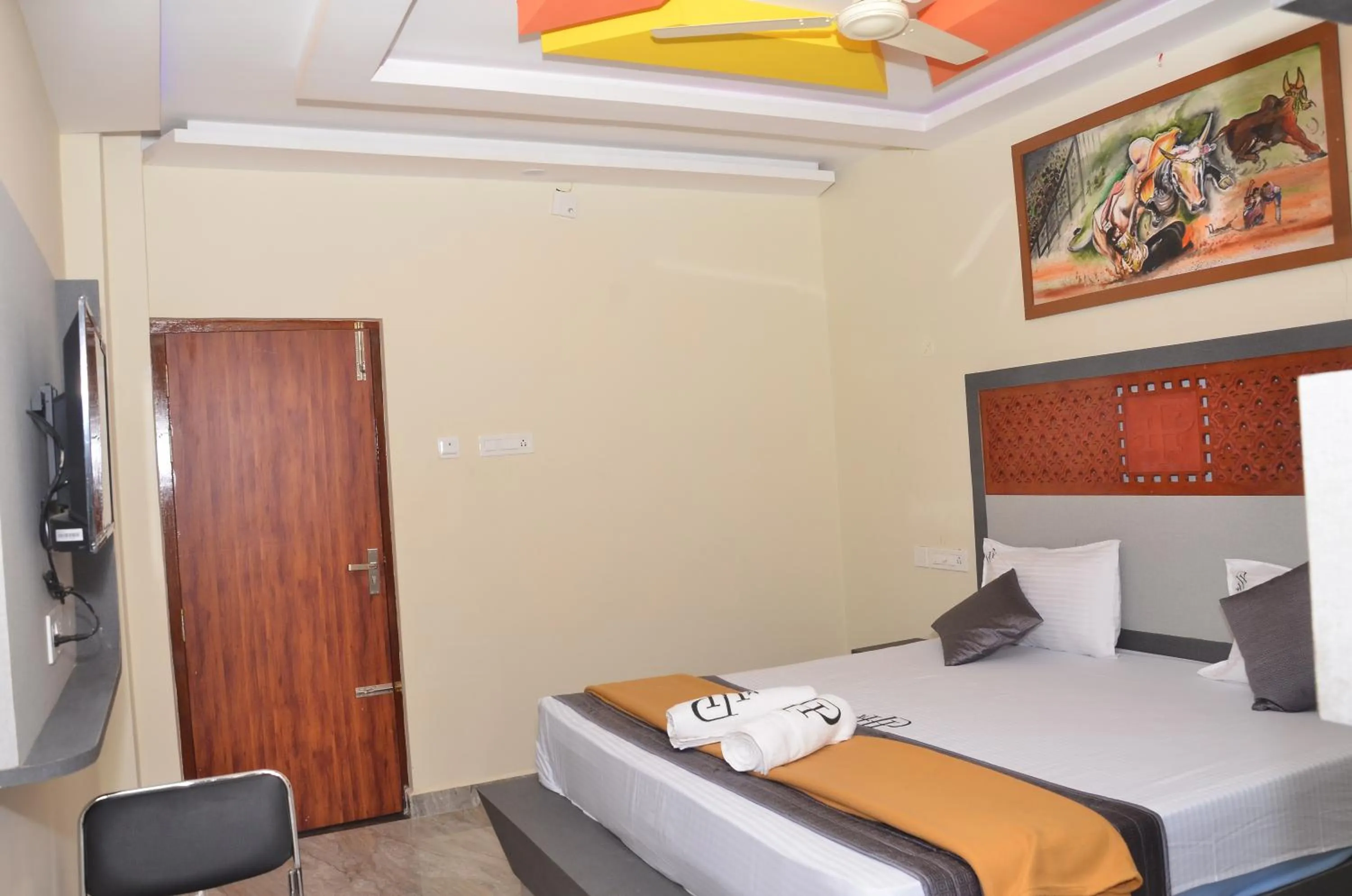 Bed in HOTEL PANCHAVARNAA