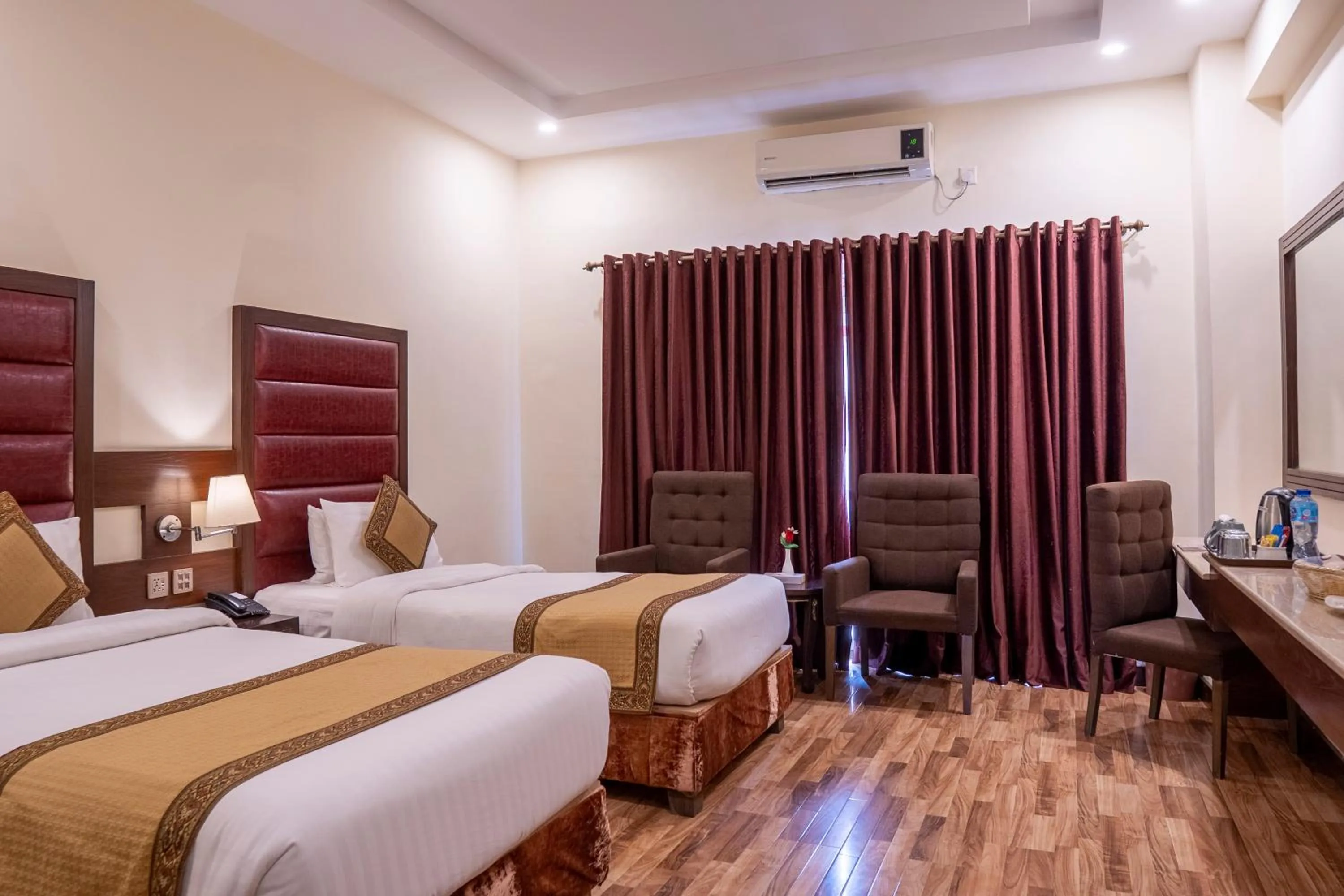 Bed in Legend Hotel Islamabad