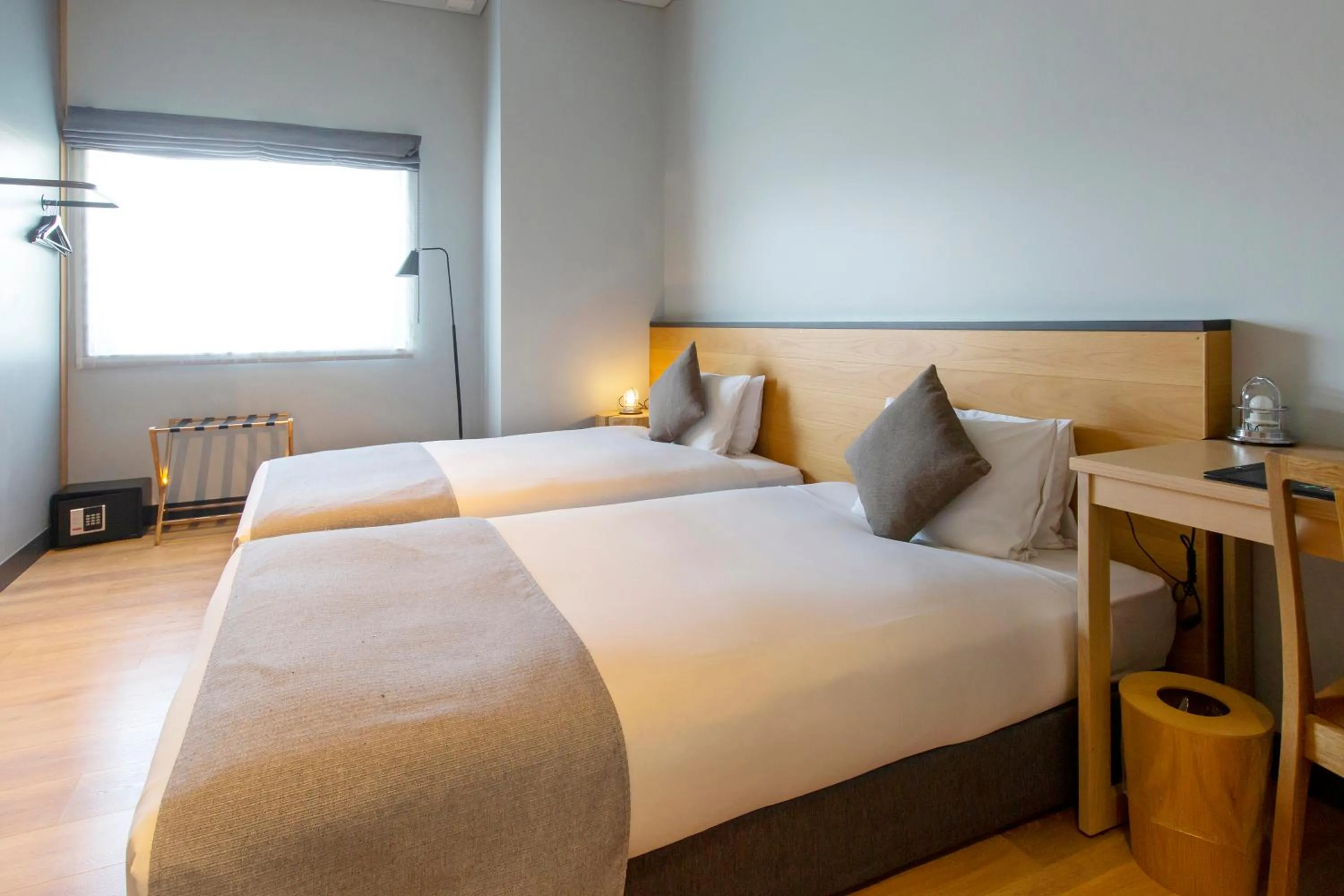 Bed in HOTEL KARUIZAWA CROSS