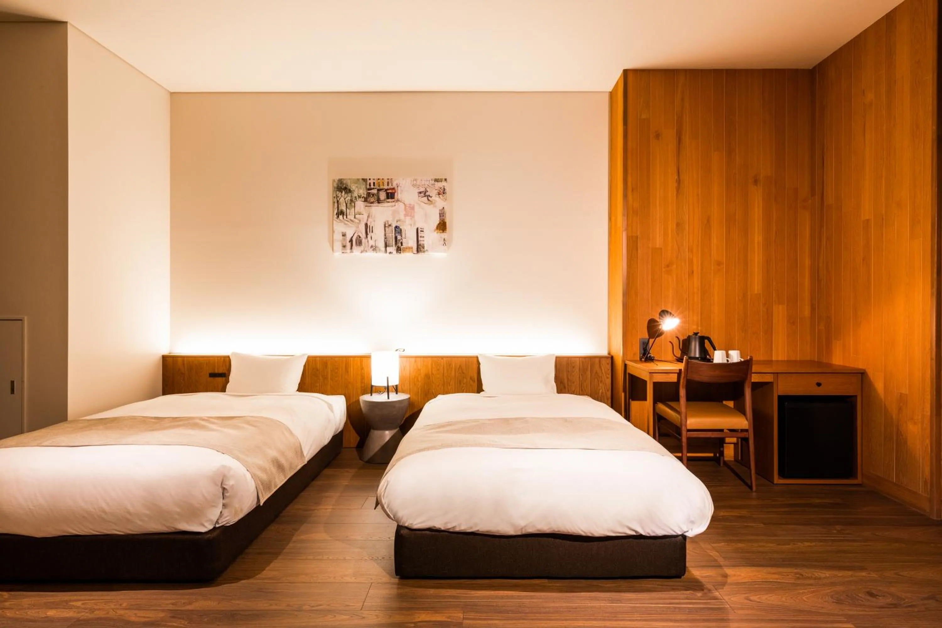 Bed in HOTEL KARUIZAWA CROSS