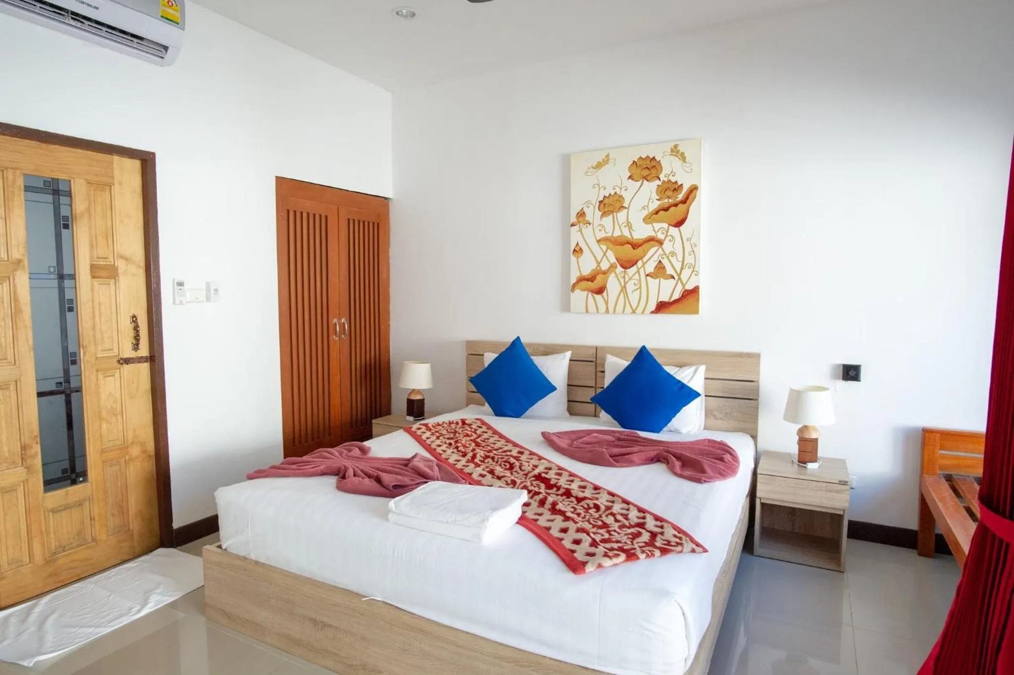 Bed in The Reef Resort