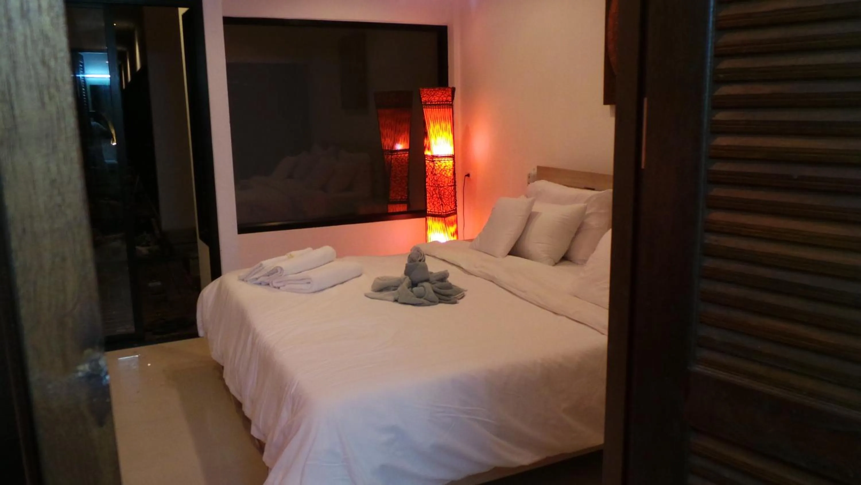 Bed in The Reef Resort