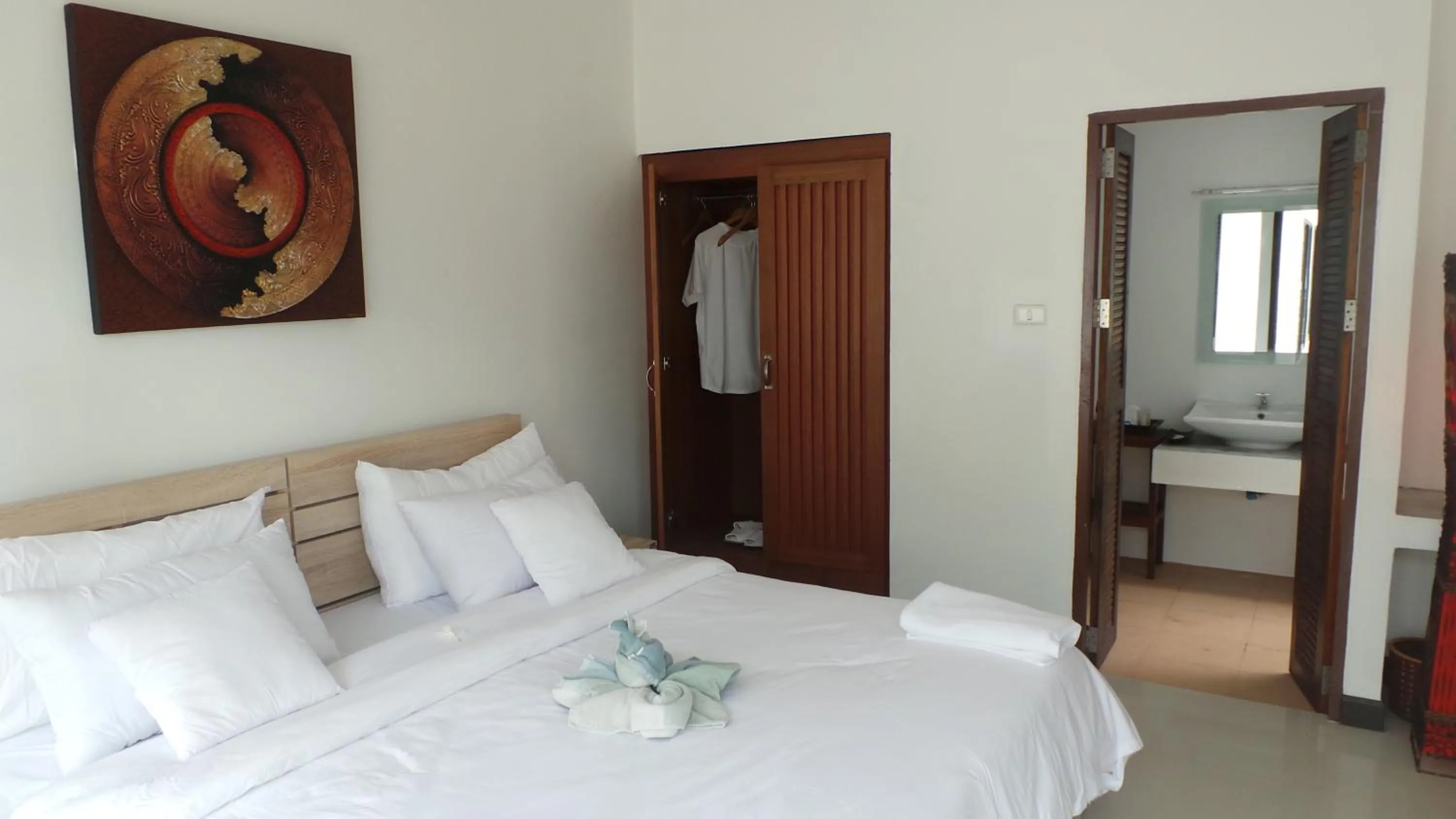 Bed in The Reef Resort