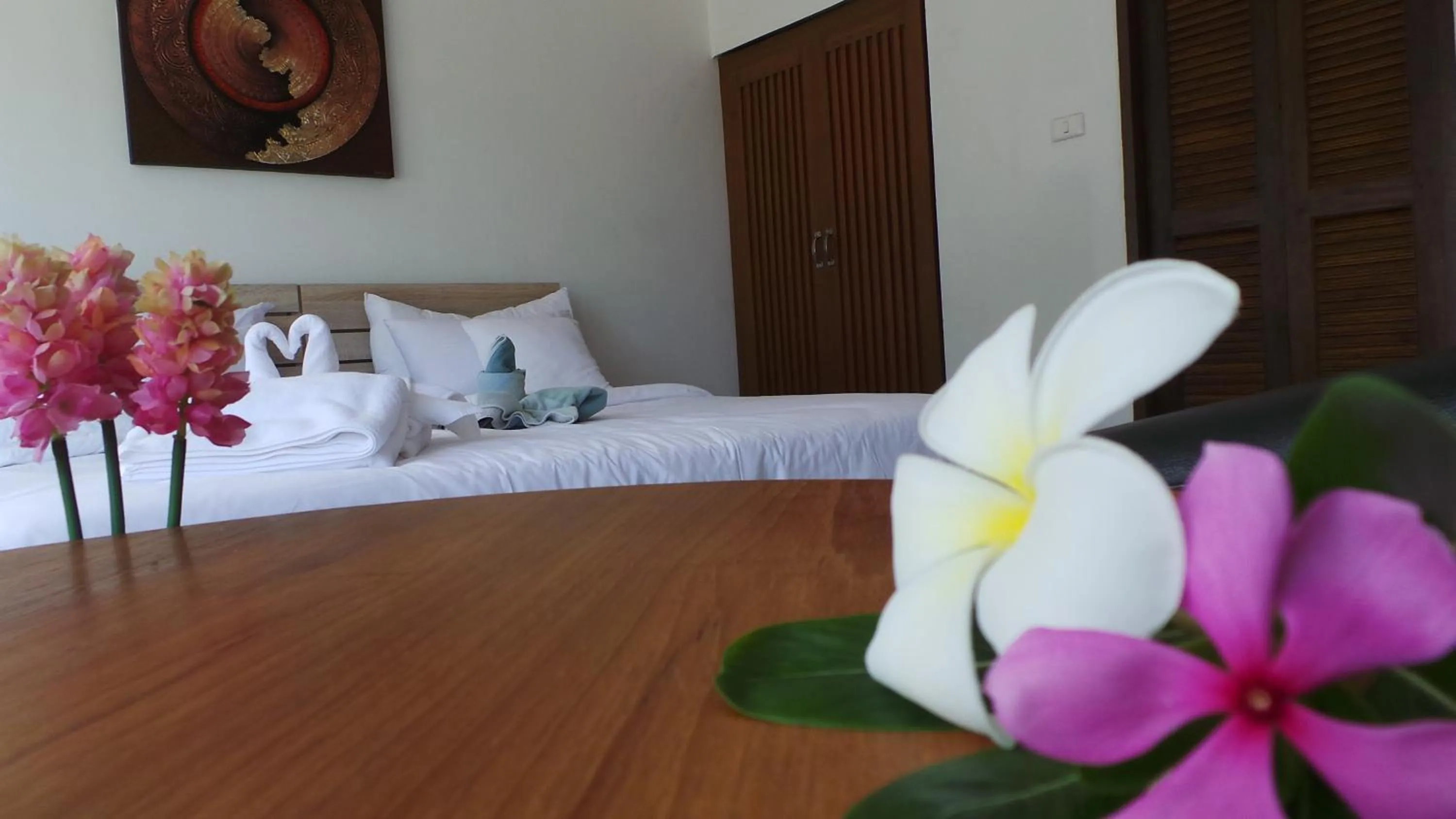 Bed in The Reef Resort