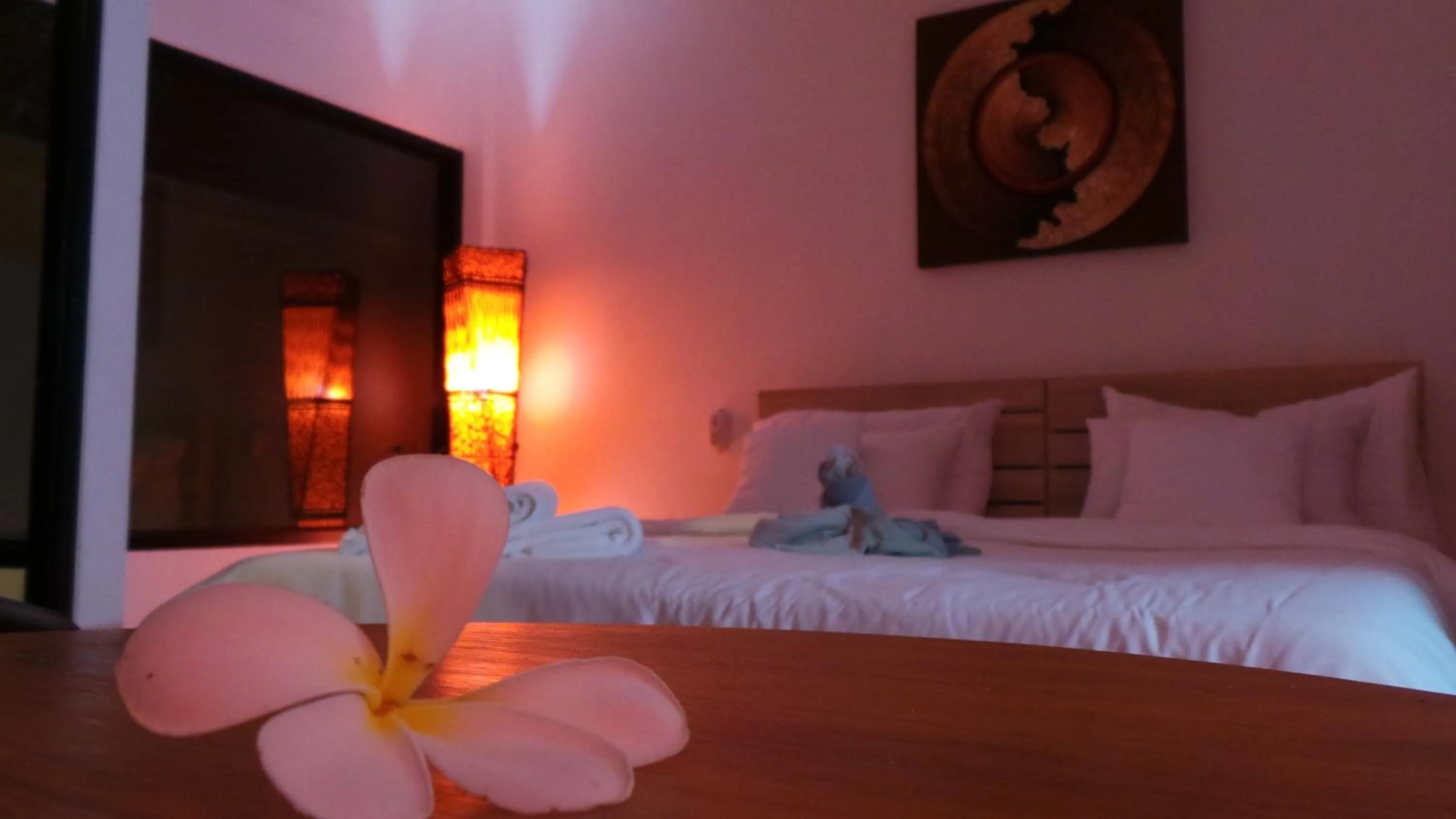 Bed in The Reef Resort