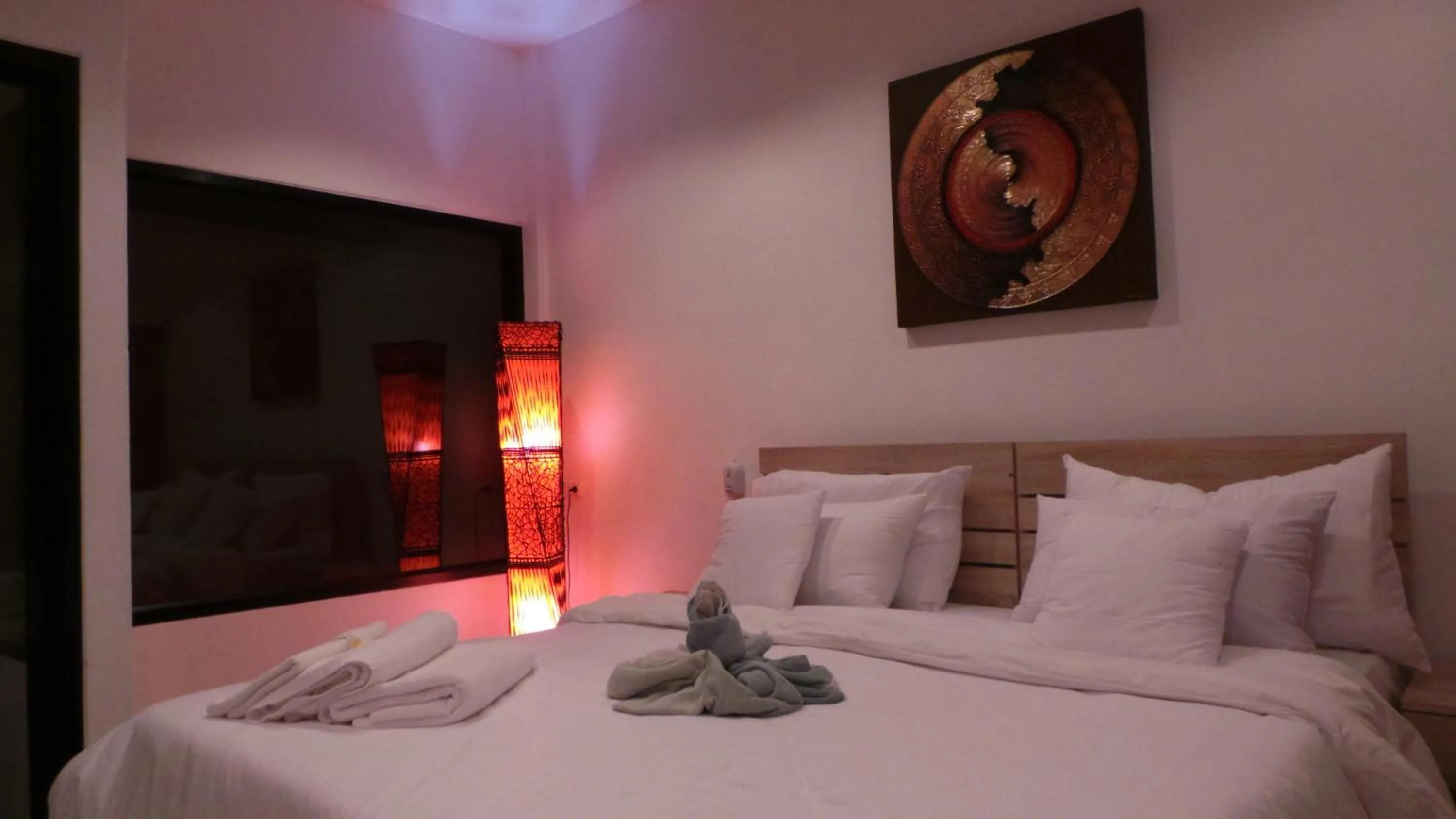 Bed in The Reef Resort