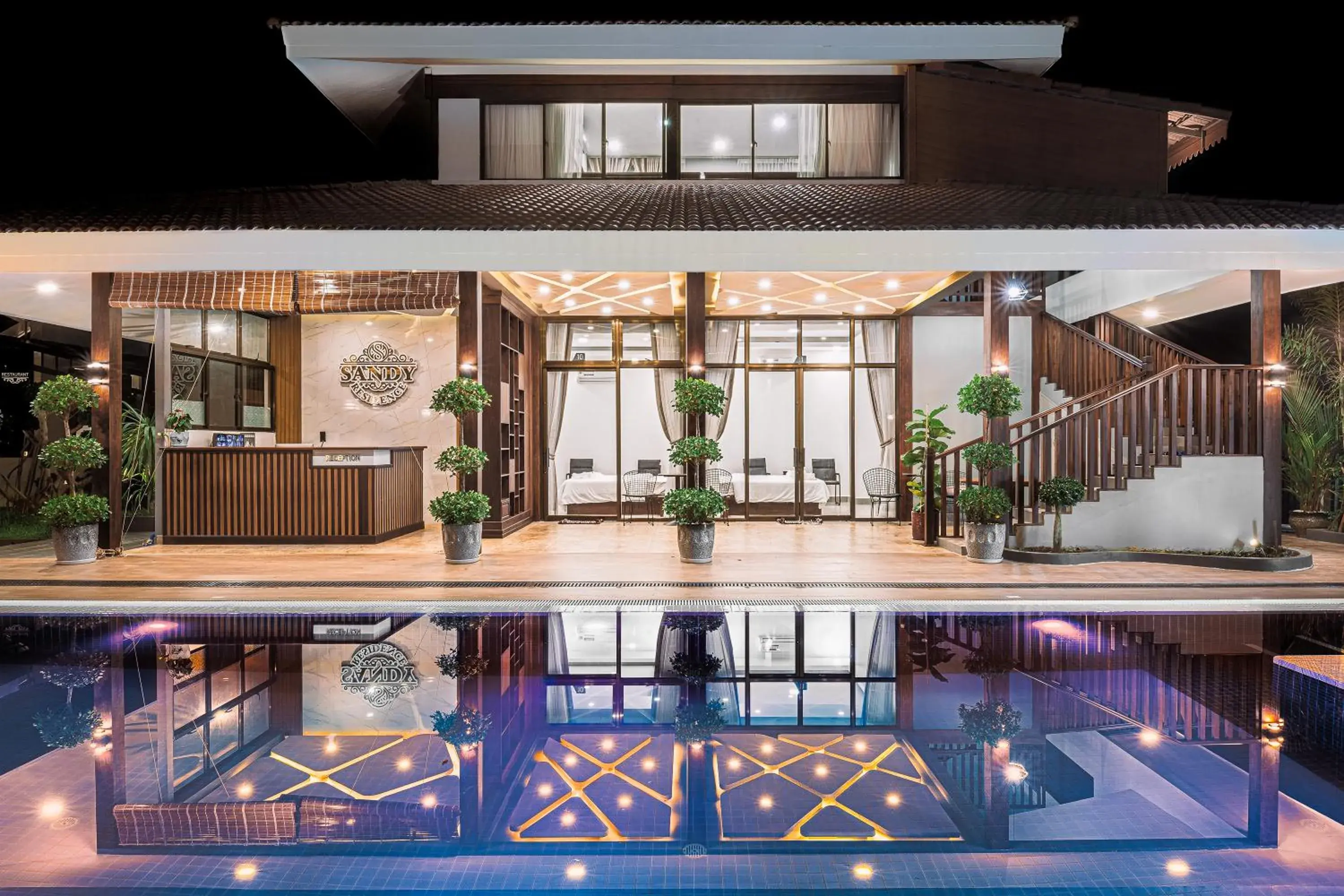 Studio Triple with Pool View first floor in Sandy Residence Sihanoukville Studio Triple with Pool View first floor in Sandy Residence Sihanoukville