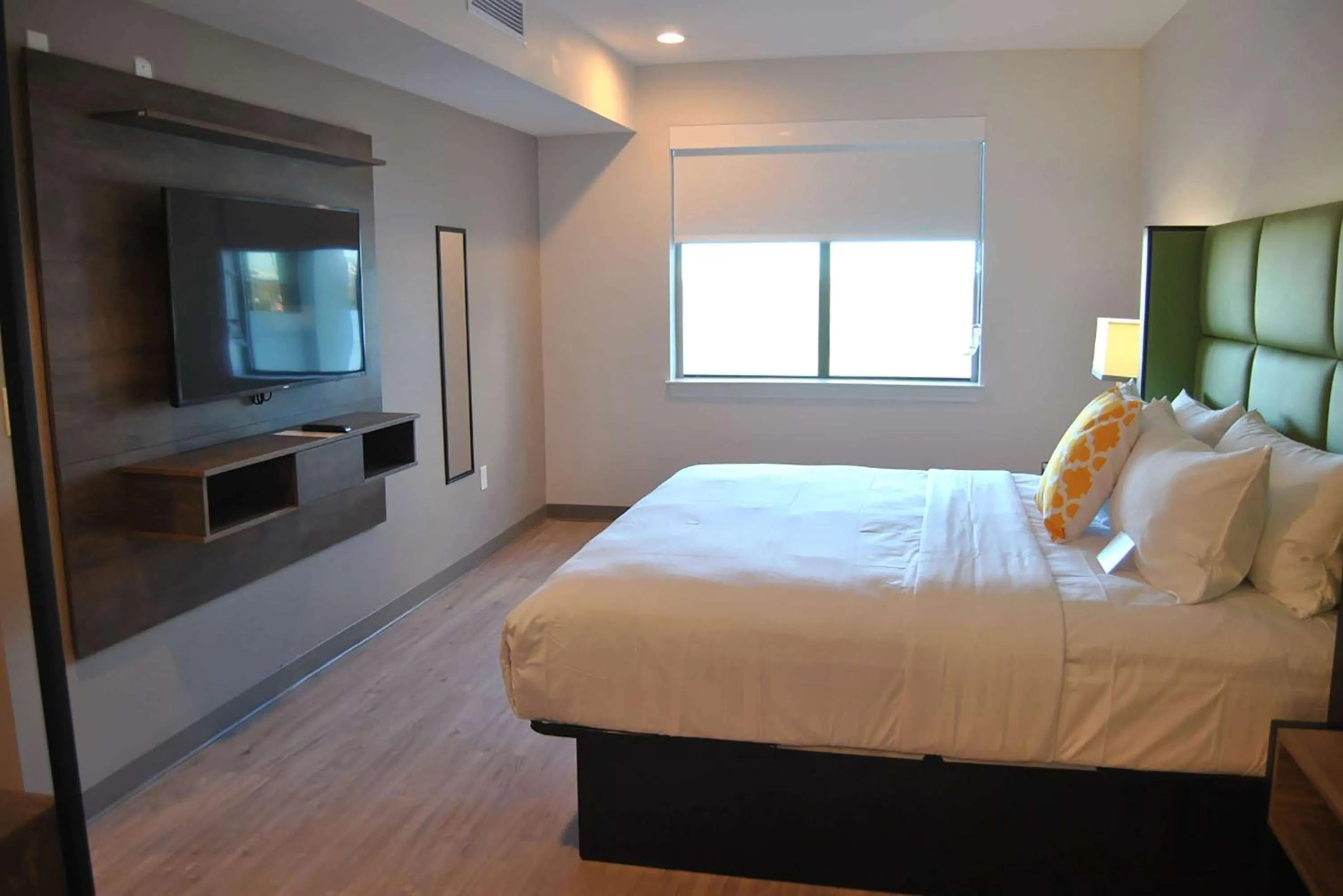 Communal lounge/ TV room, Bed in Wyndham Garden College Station