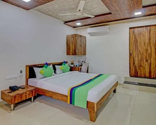 Bed in Sai Samrat Resort
