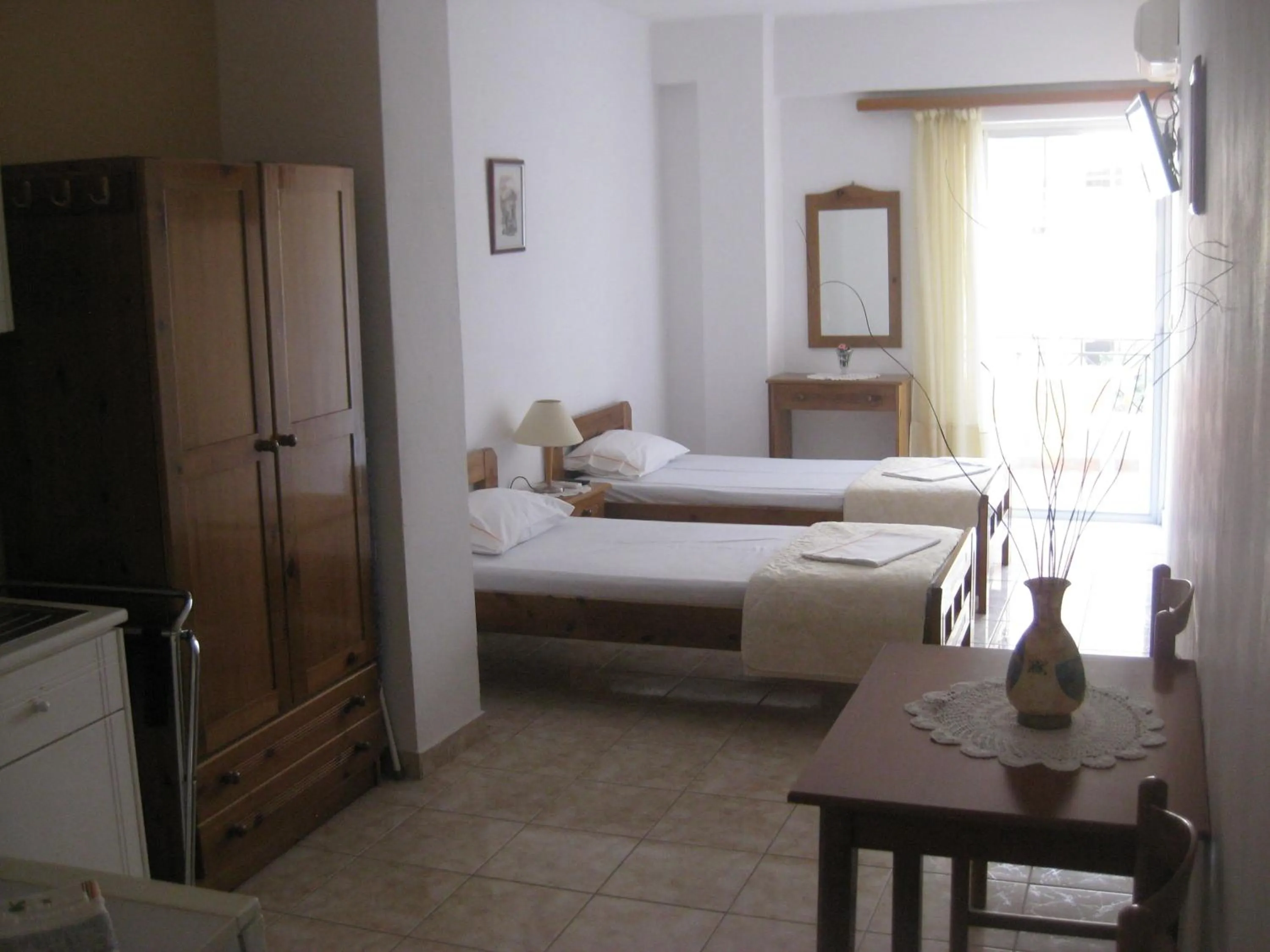 Photo of the whole room, Bed in Agalos Studios