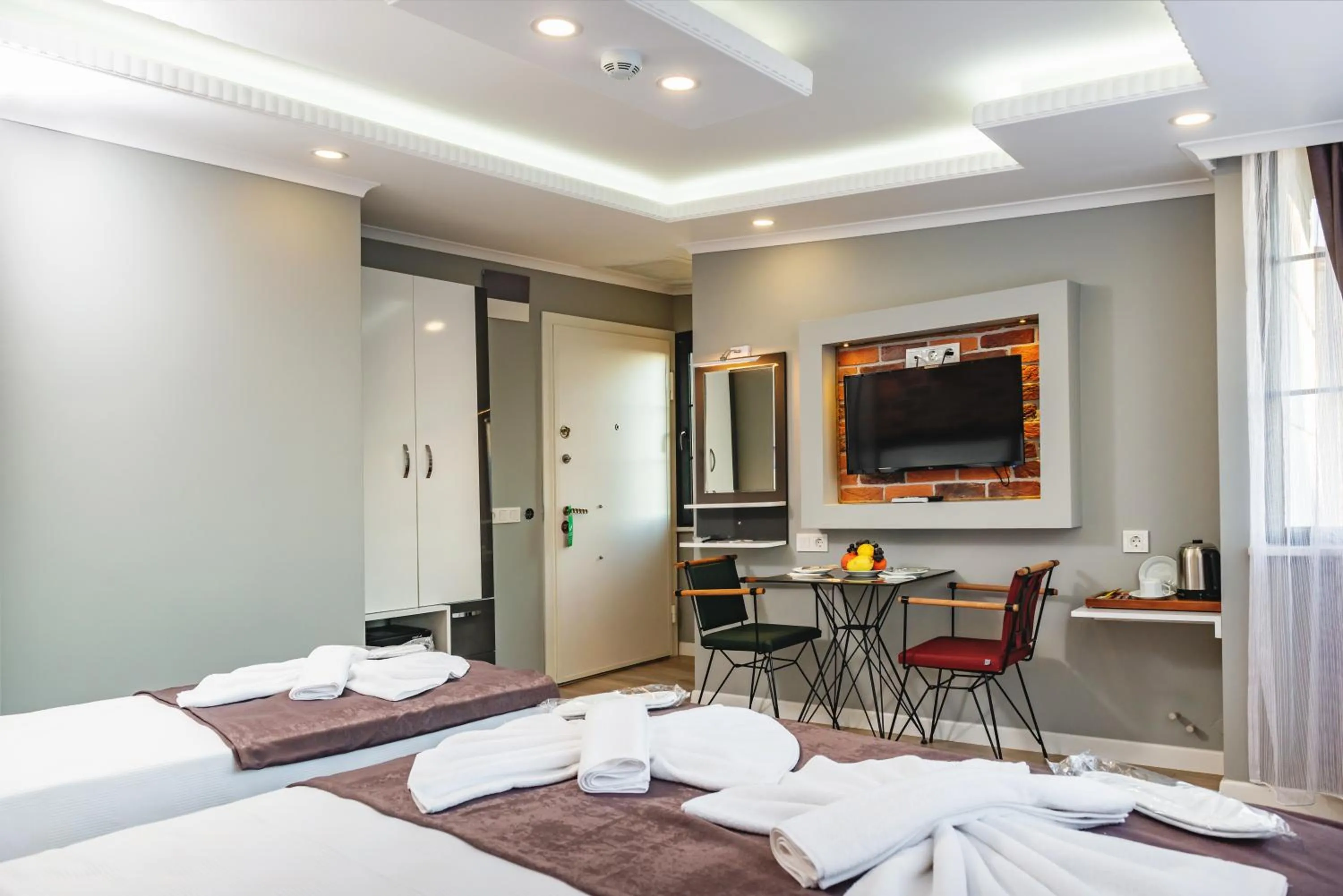 Dining area, Bed in Gloria Suites Old City