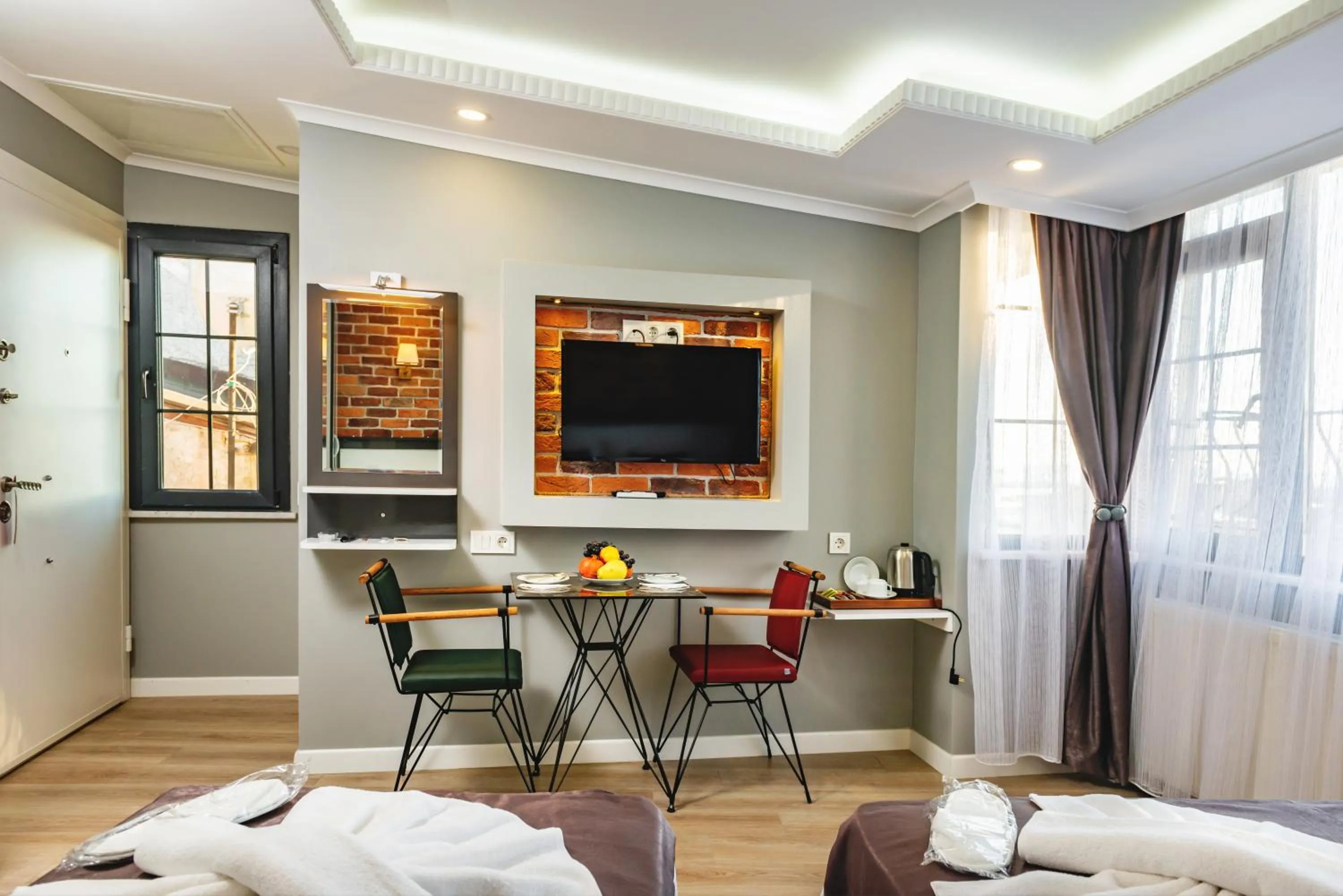 Dining area, Bed in Gloria Suites Old City