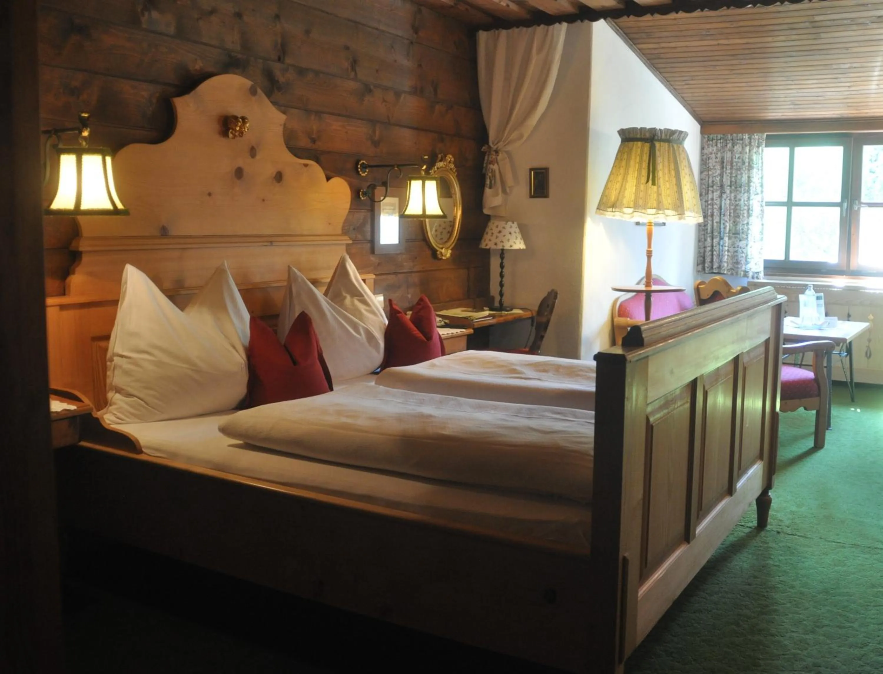 Bed in Romantikhotel Almtalhof