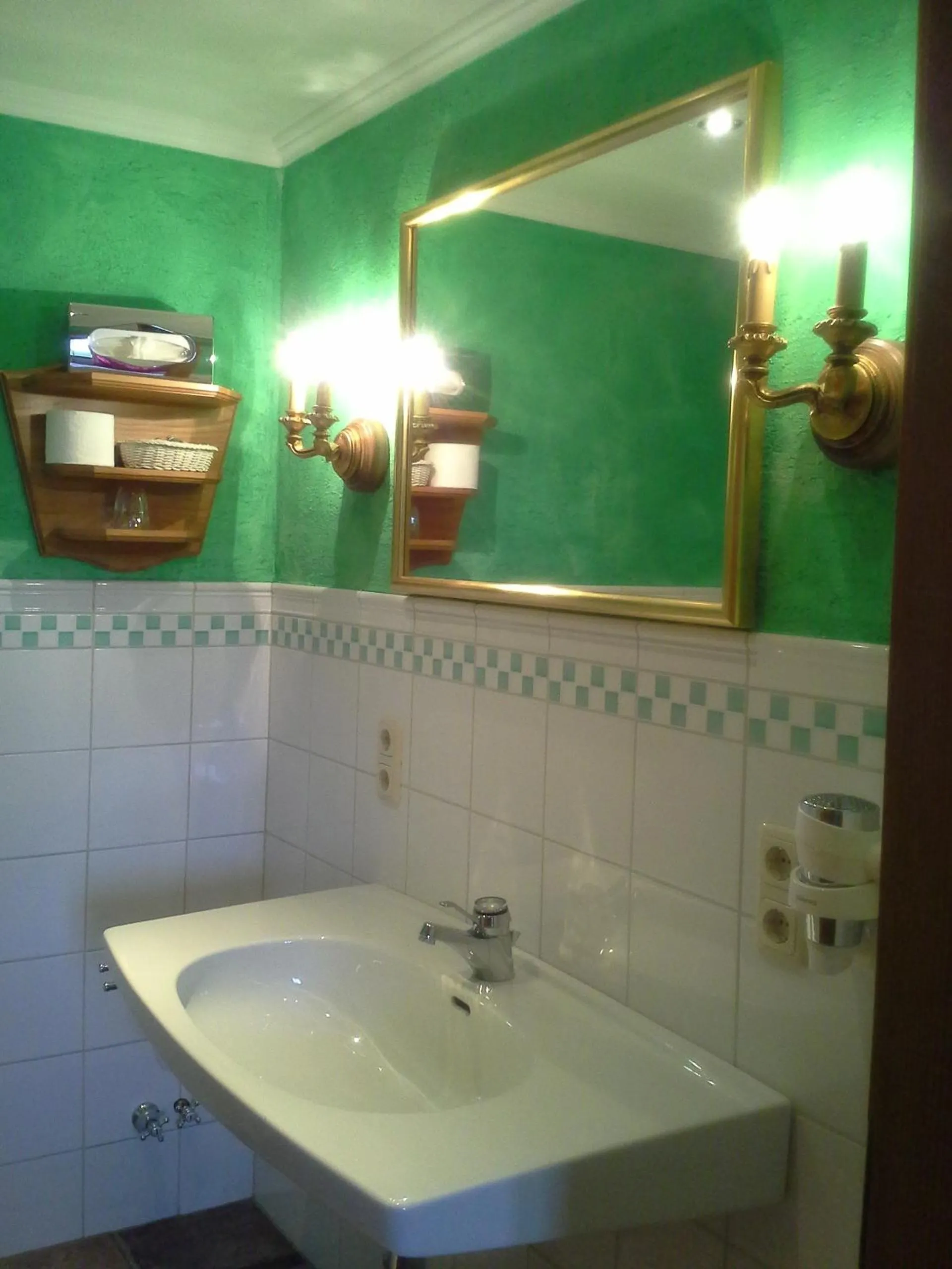 Bathroom in Romantikhotel Almtalhof