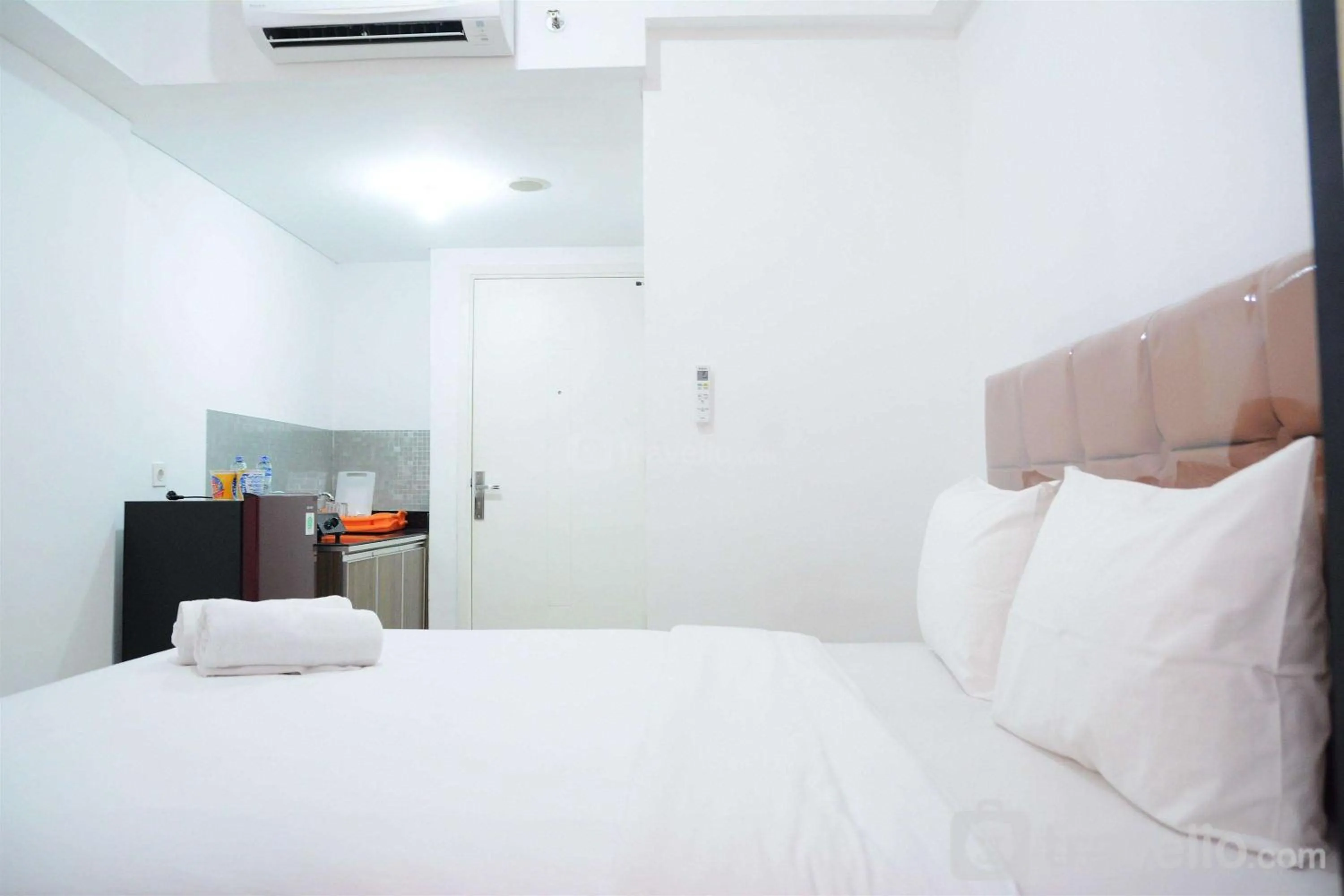 Bed in Comfy Studio Poris 88 Apartment By Travelio