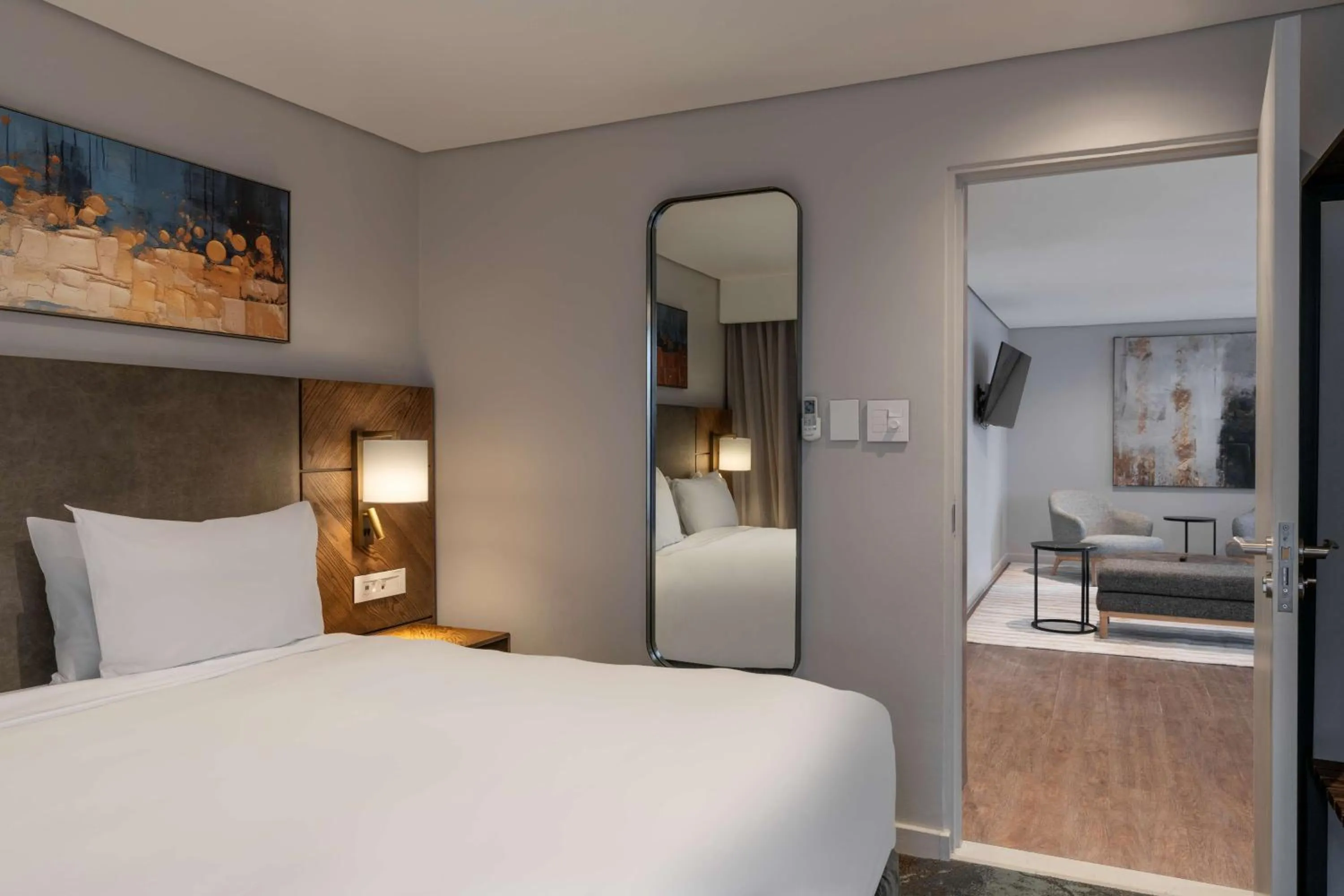 Photo of the whole room, Bed in Radisson Hotel and Convention Centre OR Tambo Airport