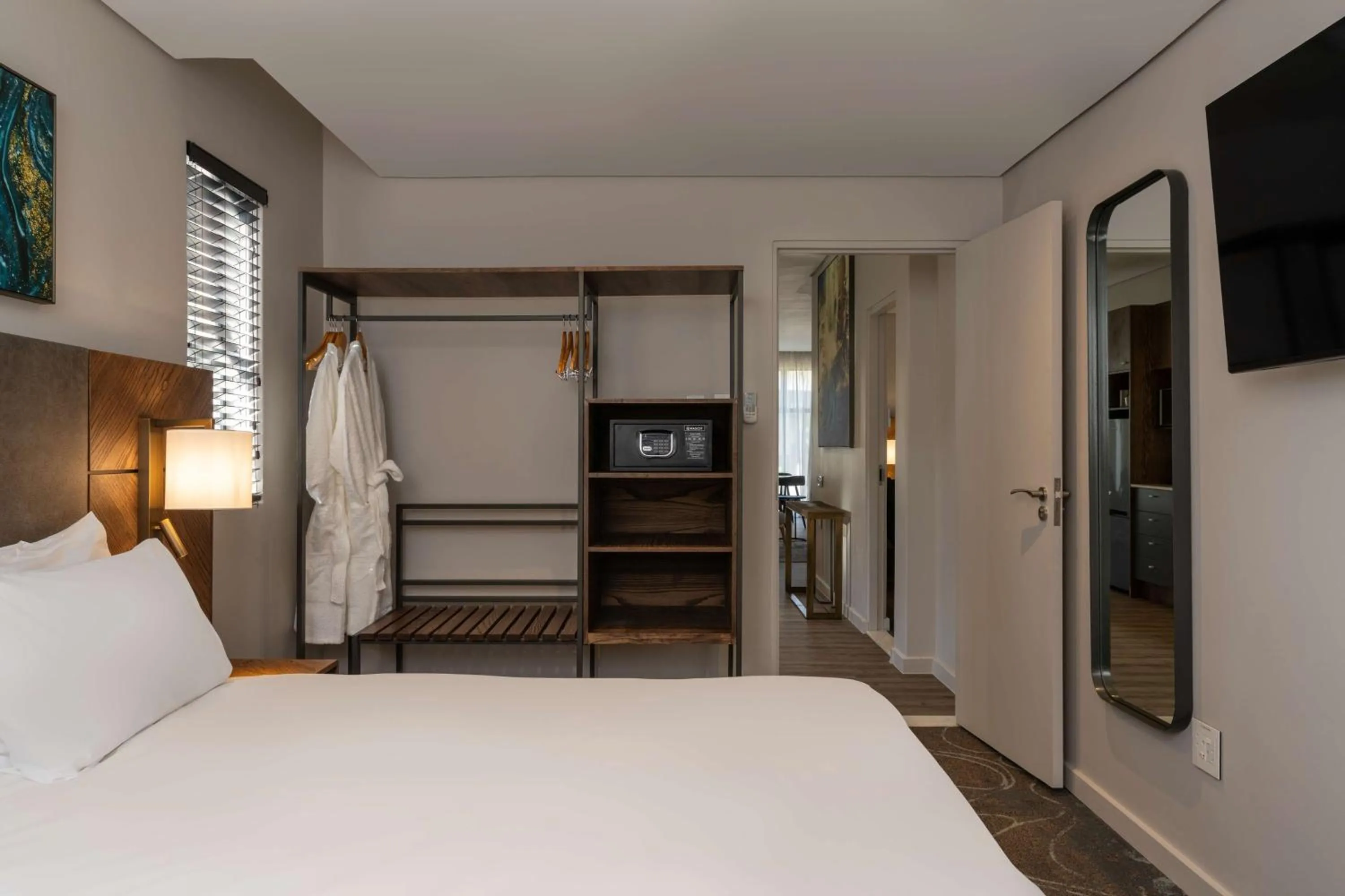 Photo of the whole room, Bed in Radisson Hotel and Convention Centre OR Tambo Airport