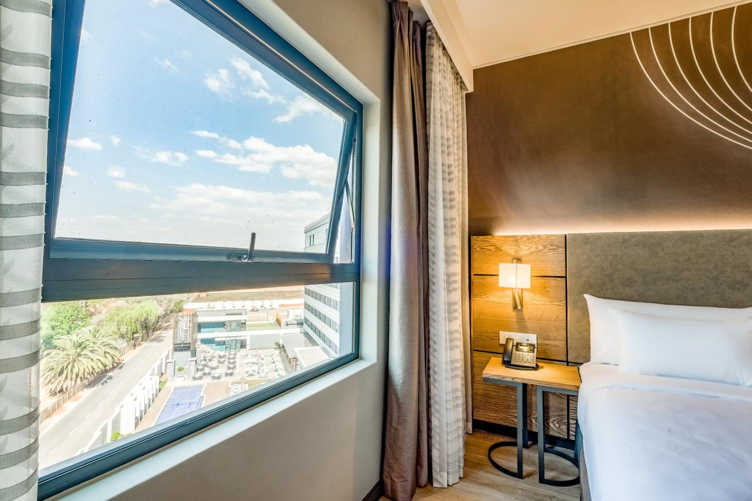 Bird's eye view, Bed in Radisson Hotel and Convention Centre OR Tambo Airport