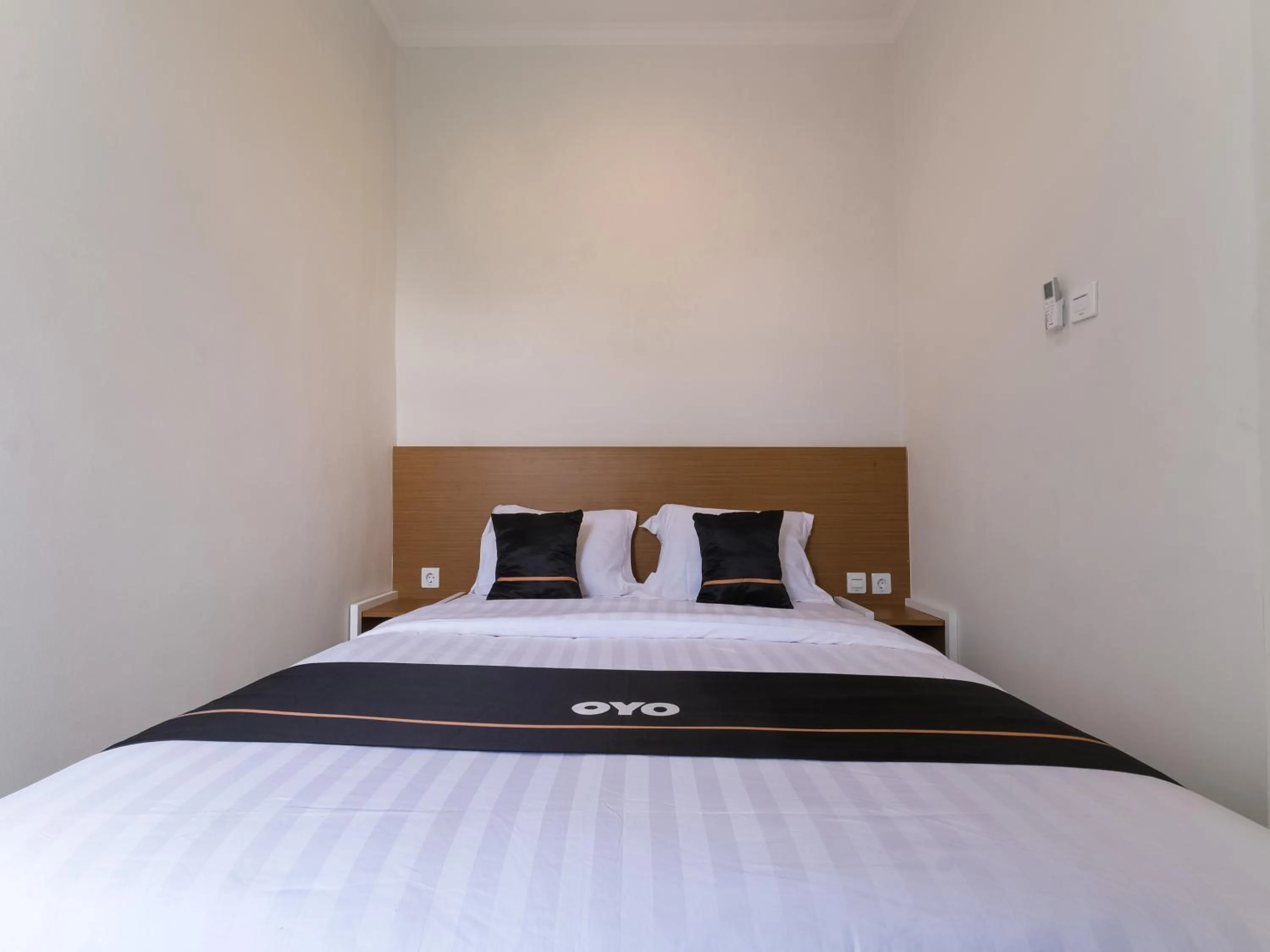 Bedroom in Super OYO Collection O 90023 Damar Kusumo Guest House