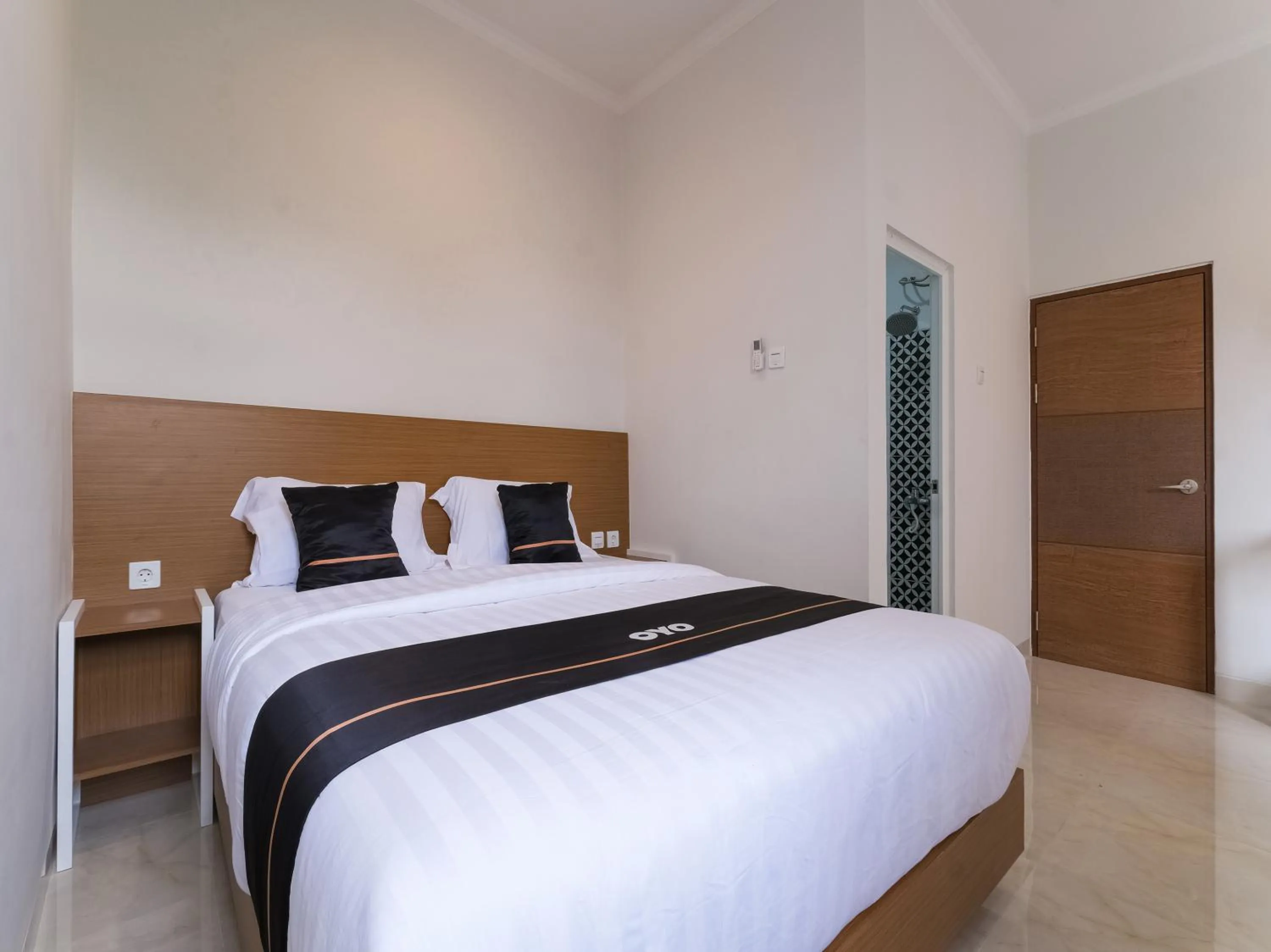 Bedroom in Super OYO Collection O 90023 Damar Kusumo Guest House