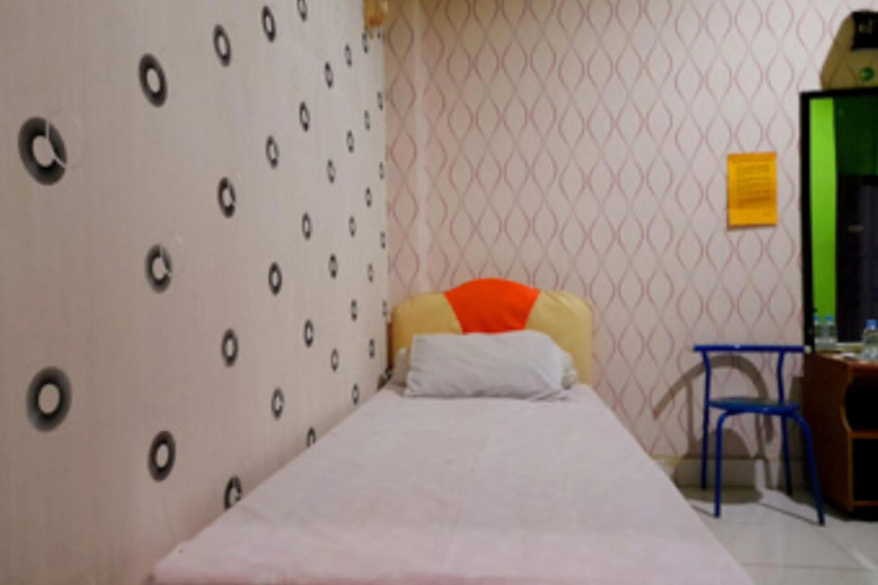 Bed in Hotel Rosichan Bau Bau Mitra RedDoorz