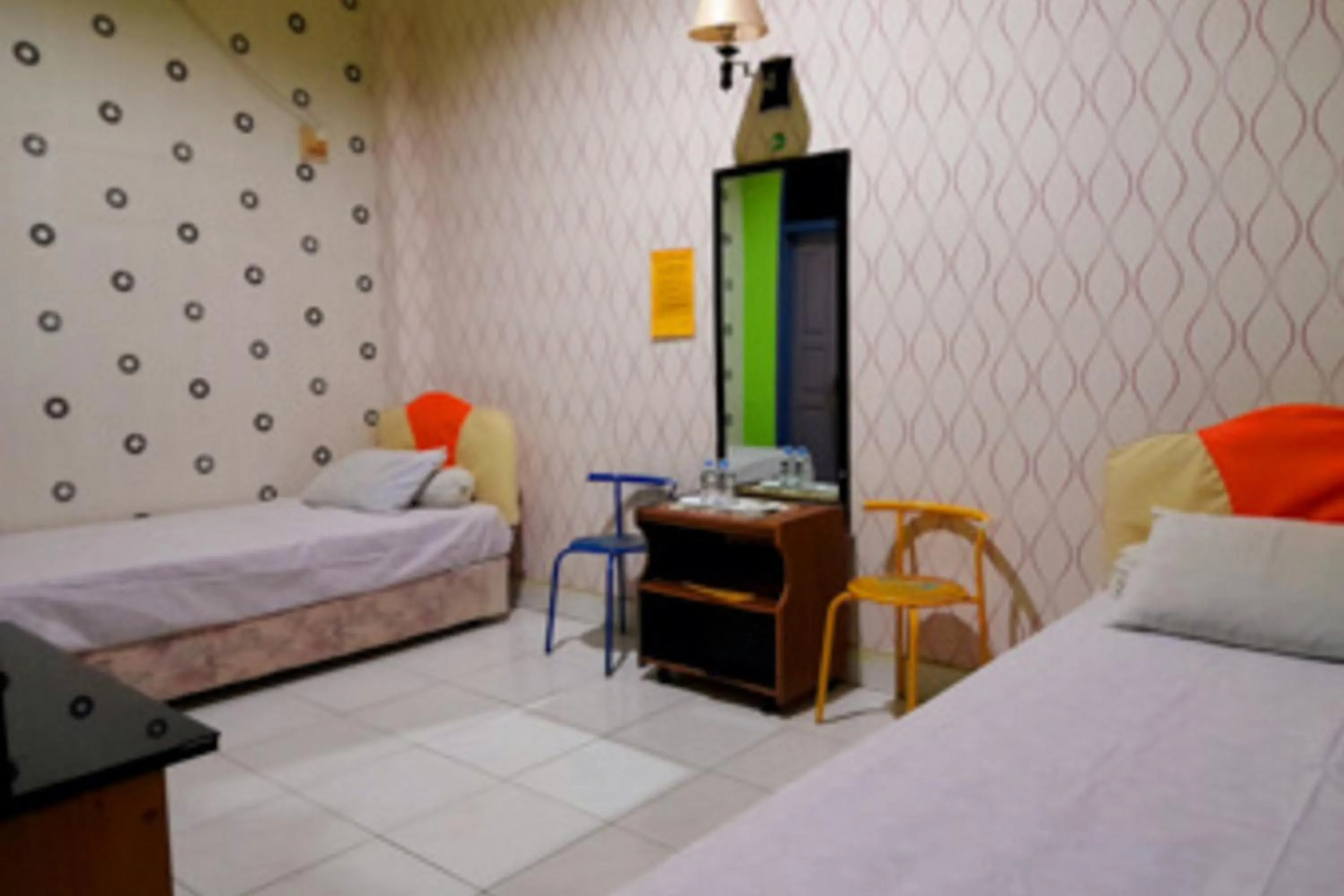 Bed in Hotel Rosichan Bau Bau Mitra RedDoorz