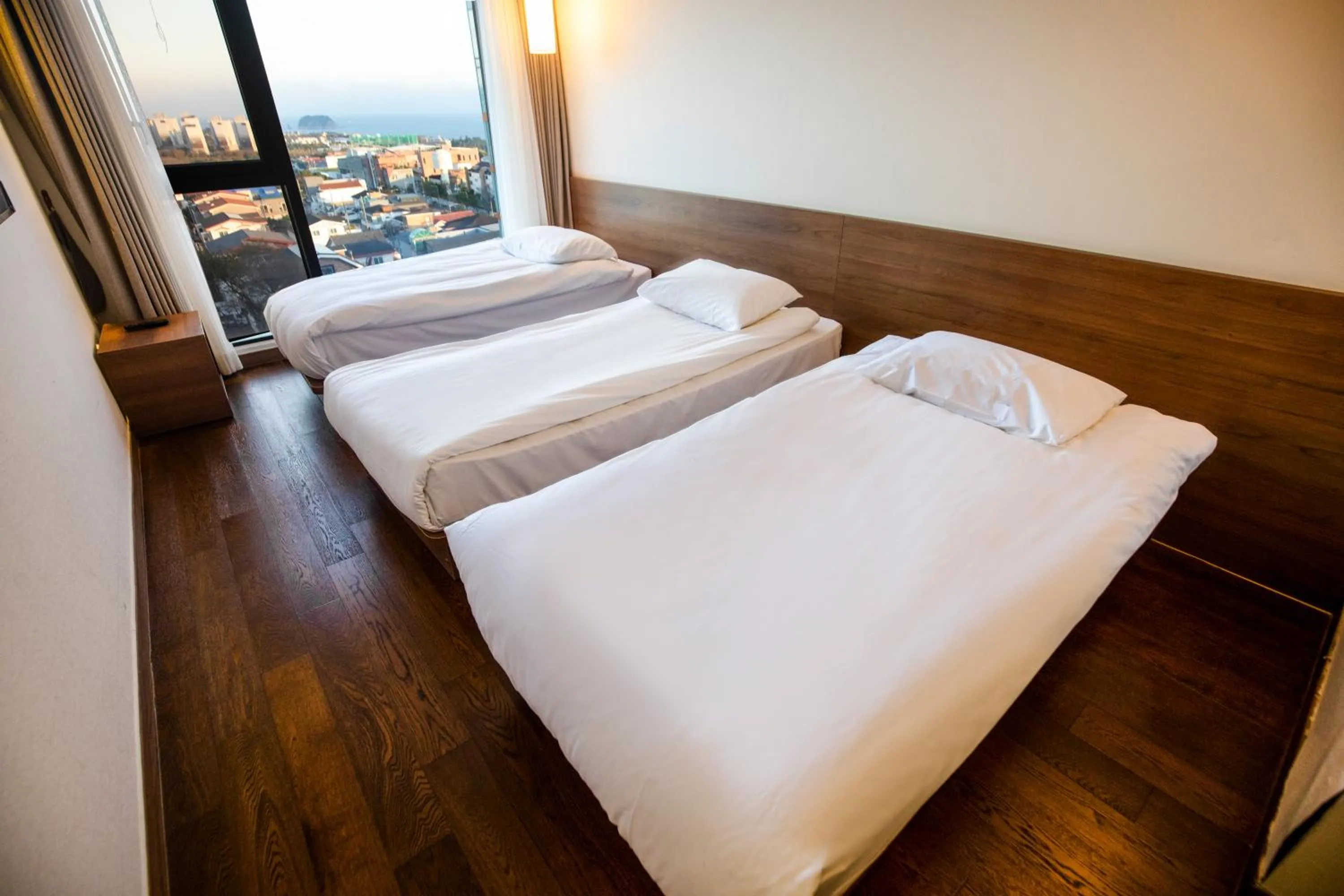 Area and facilities, Bed in Tamara Jeju hotel