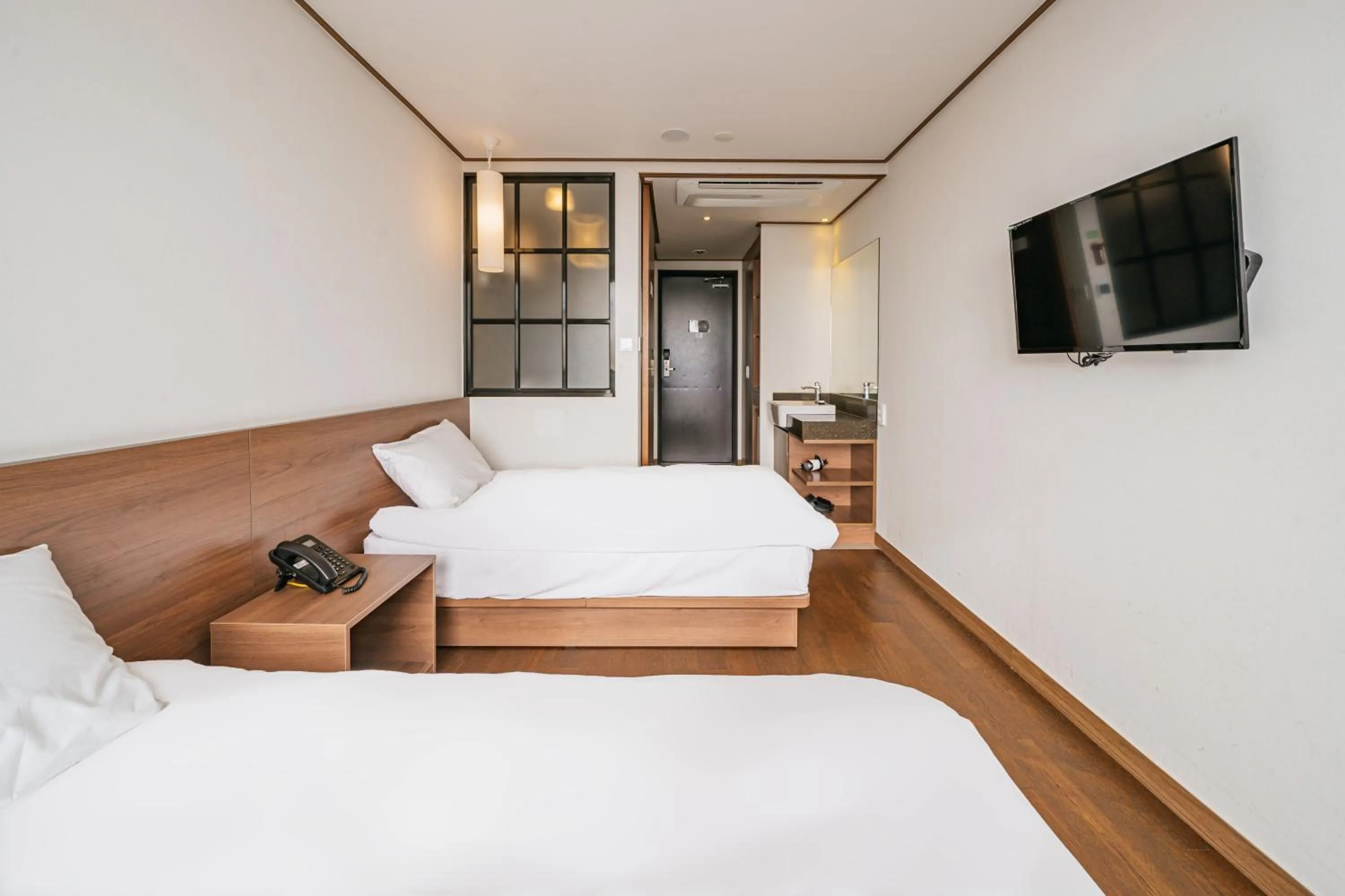 Bed in Tamara Jeju hotel