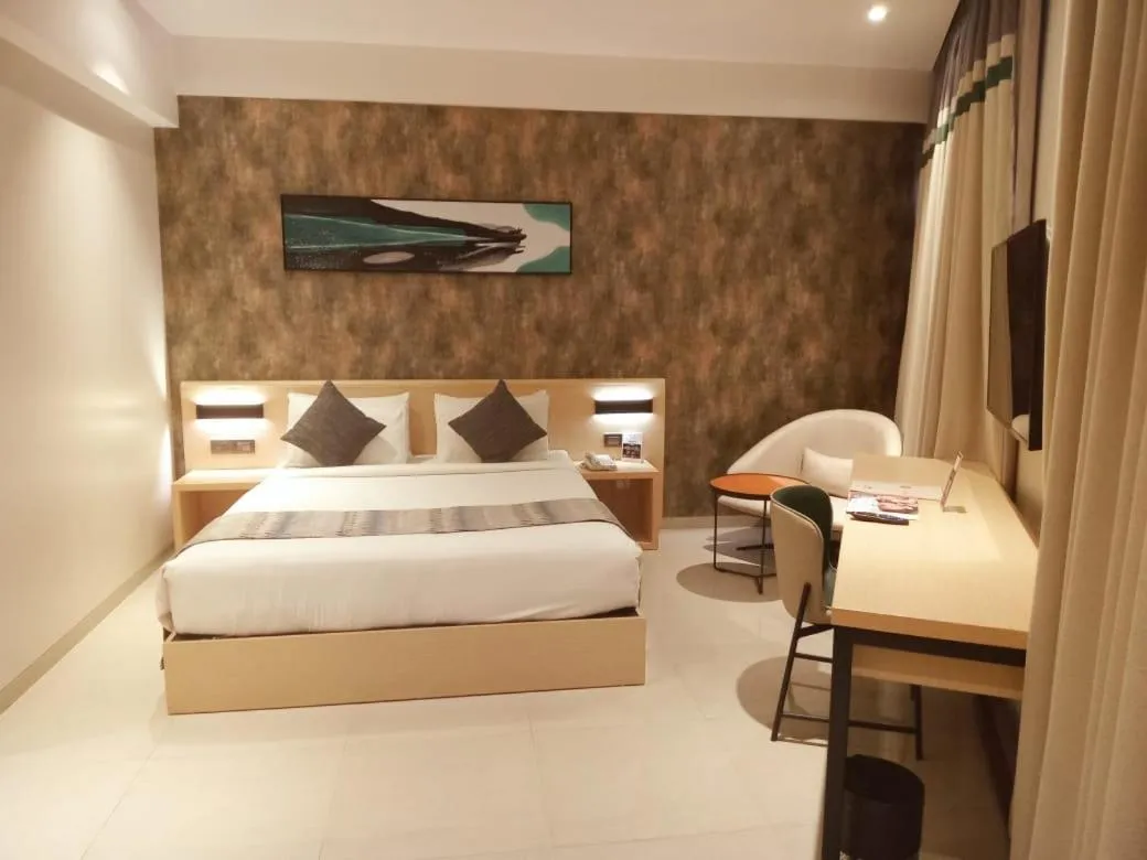 Bed in Click Hotel Bangalore - International Airport