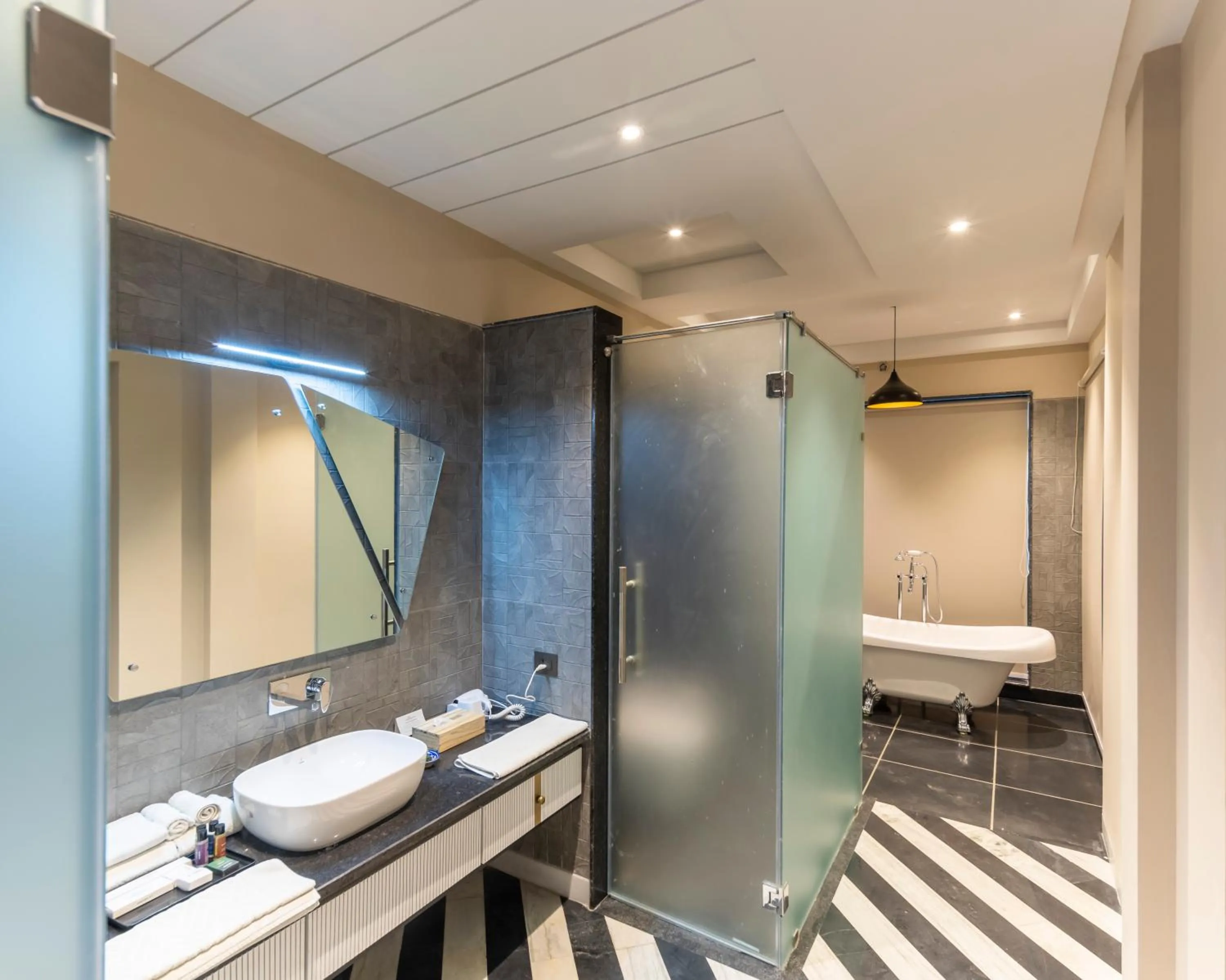 Shower in Vanaashrya Resort and Spa Sariska