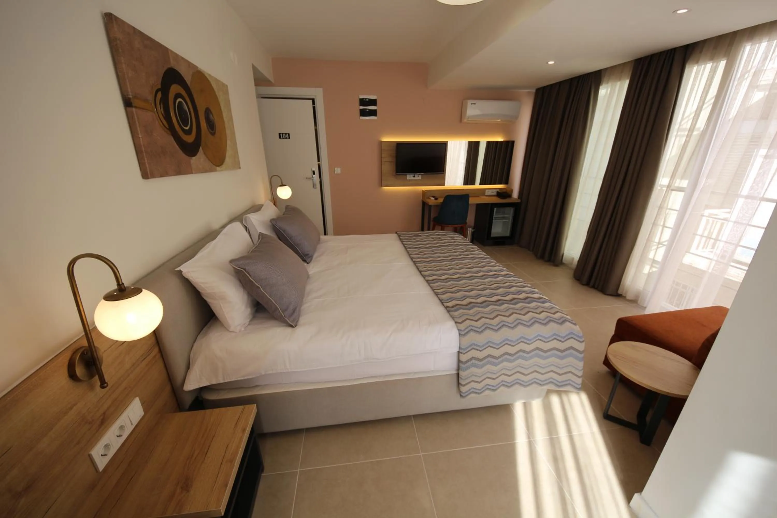 Bed in SPİLOS GÜMÜLDÜR HOTEL