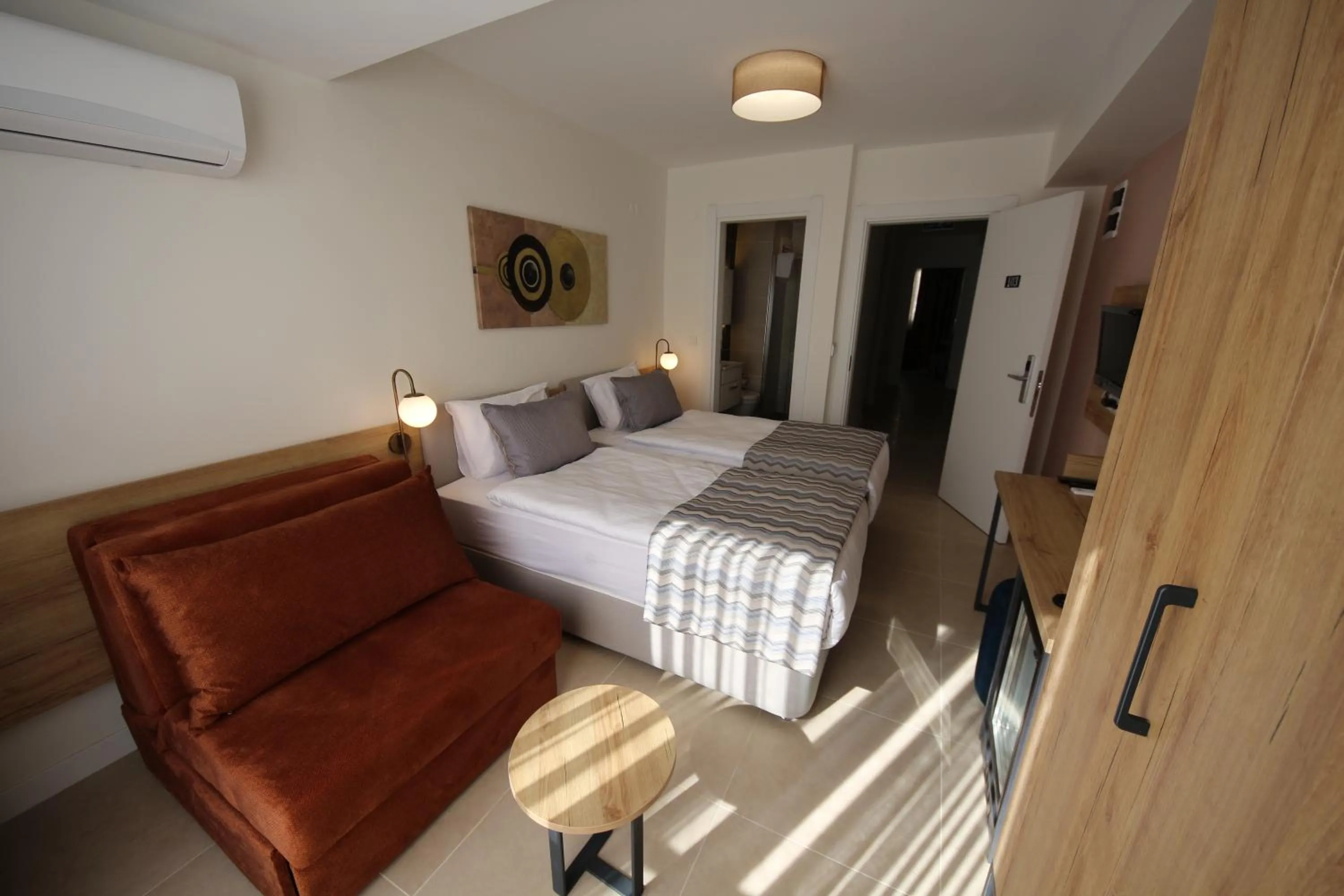 Bed in SPİLOS GÜMÜLDÜR HOTEL